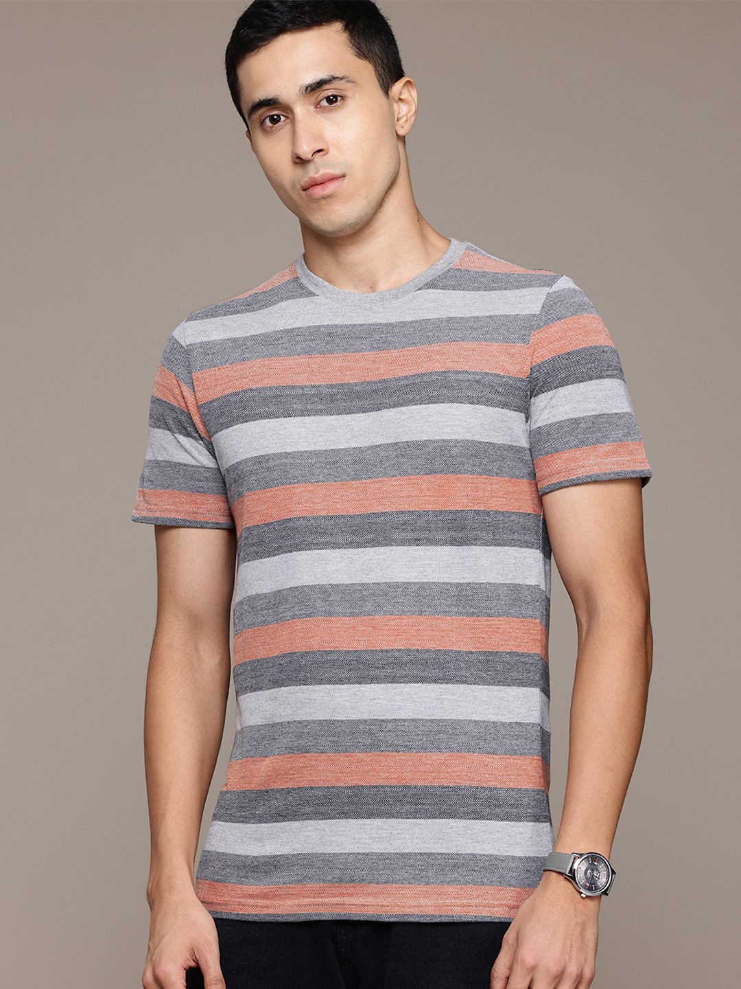 

Roadster Men Striped T-shirt, Orange