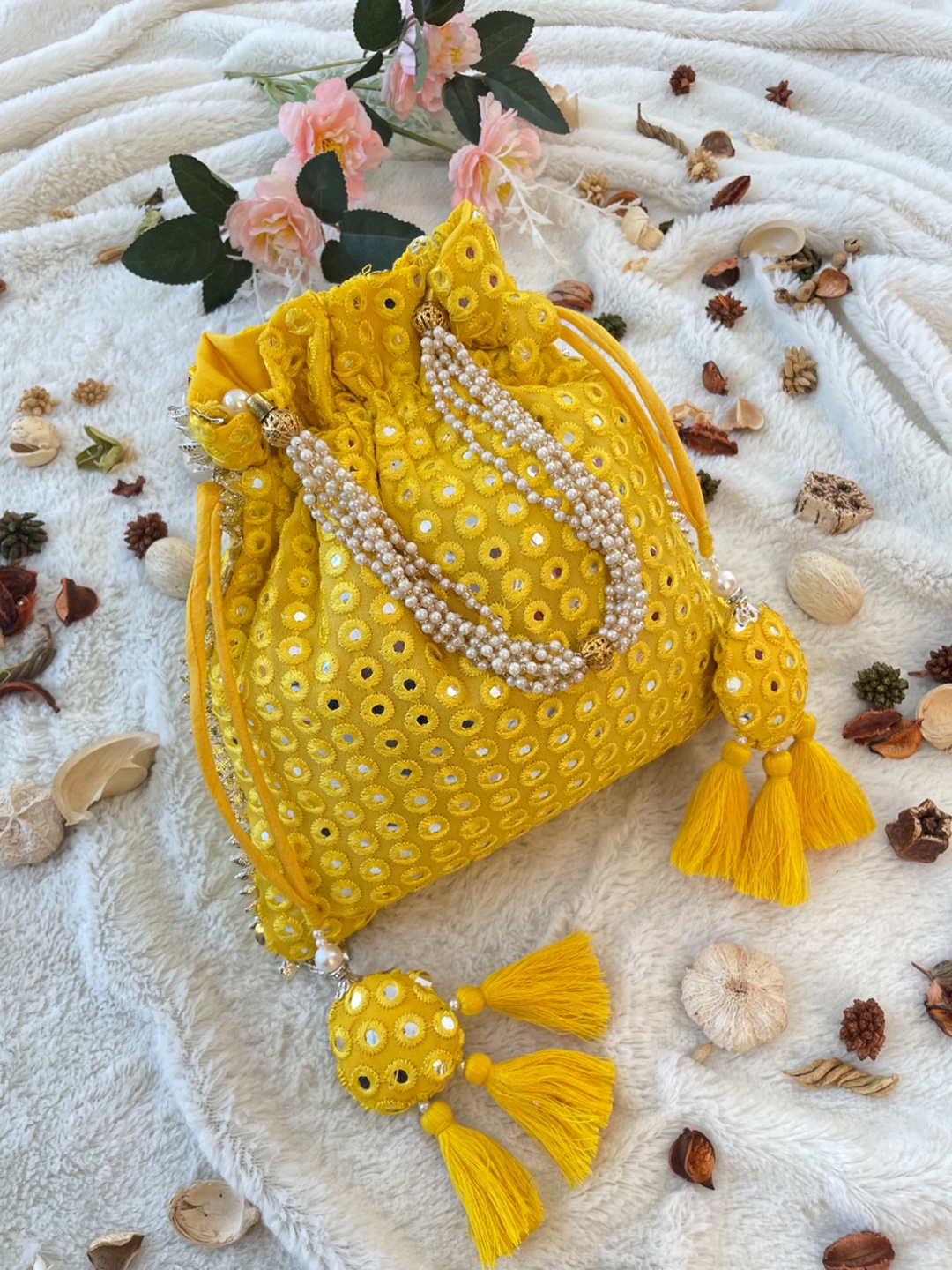 

LABEL KANUPRIYA Embellished Mirror Work Potli Clutch, Yellow