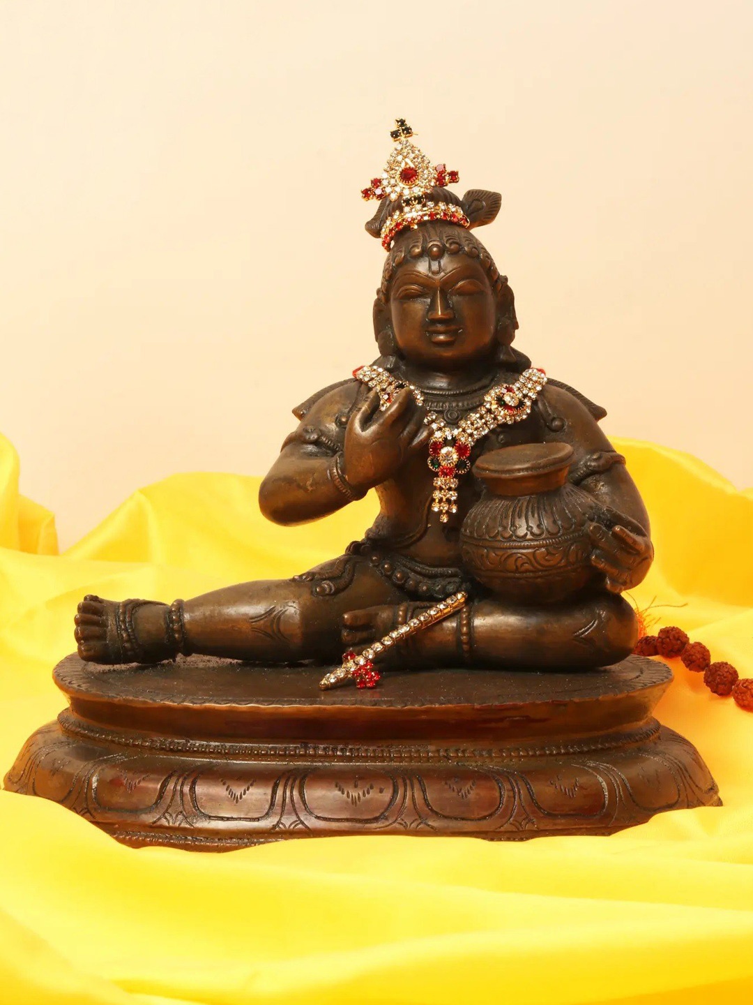 

Exotic India Brown Religious Idol Showpiece