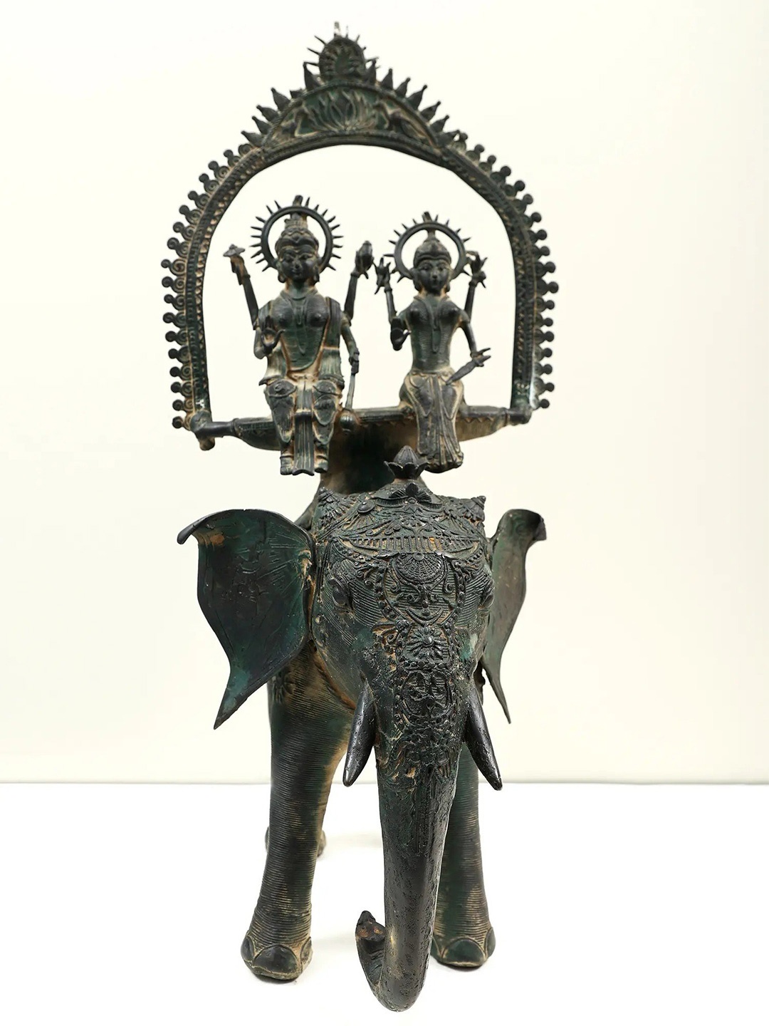 

Exotic India Black Vishnu Lakshmi Seated on Elephant Religious Idol Showpiece