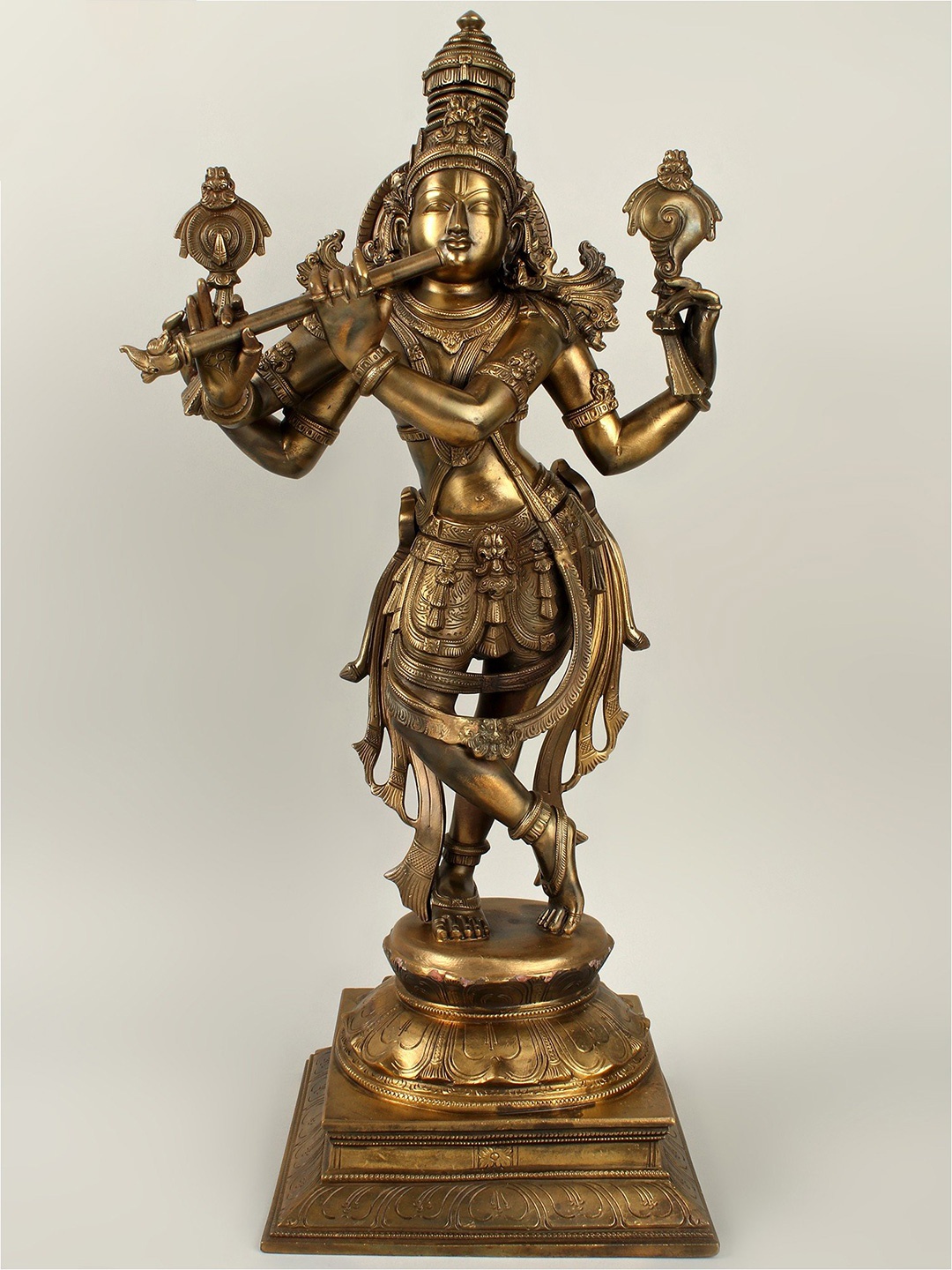 

Exotic India Gold-Toned Textured Lord Krishna Religious Idol Showpiece