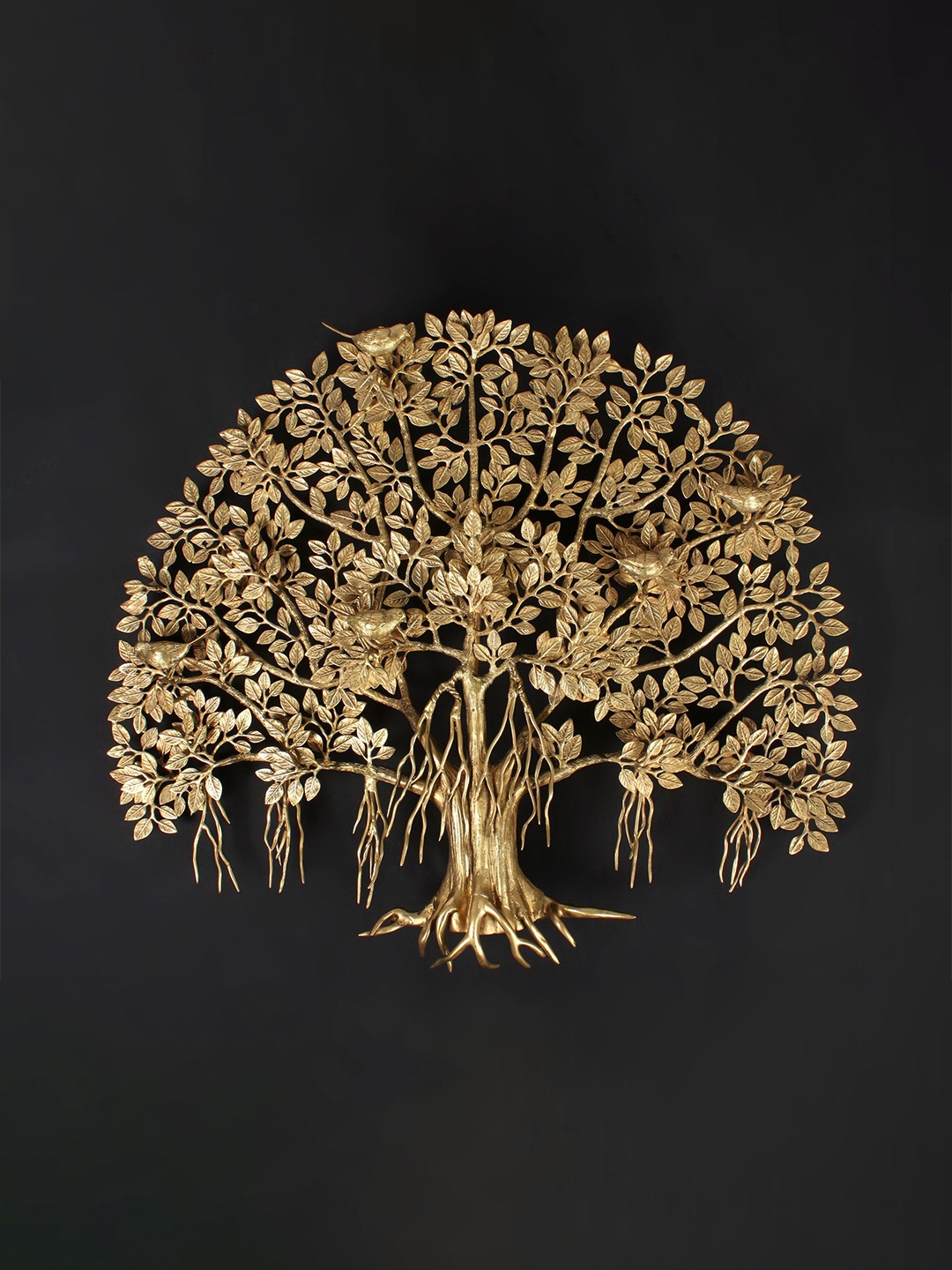 

Exotic India Gold Toned Brass Figurine Showpiece