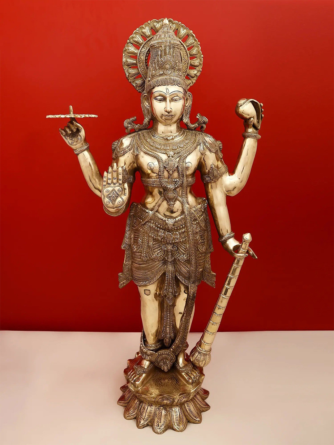 

Exotic India Gold-Toned Standing Lord Vishnu Brass Religious Idol Showpiece