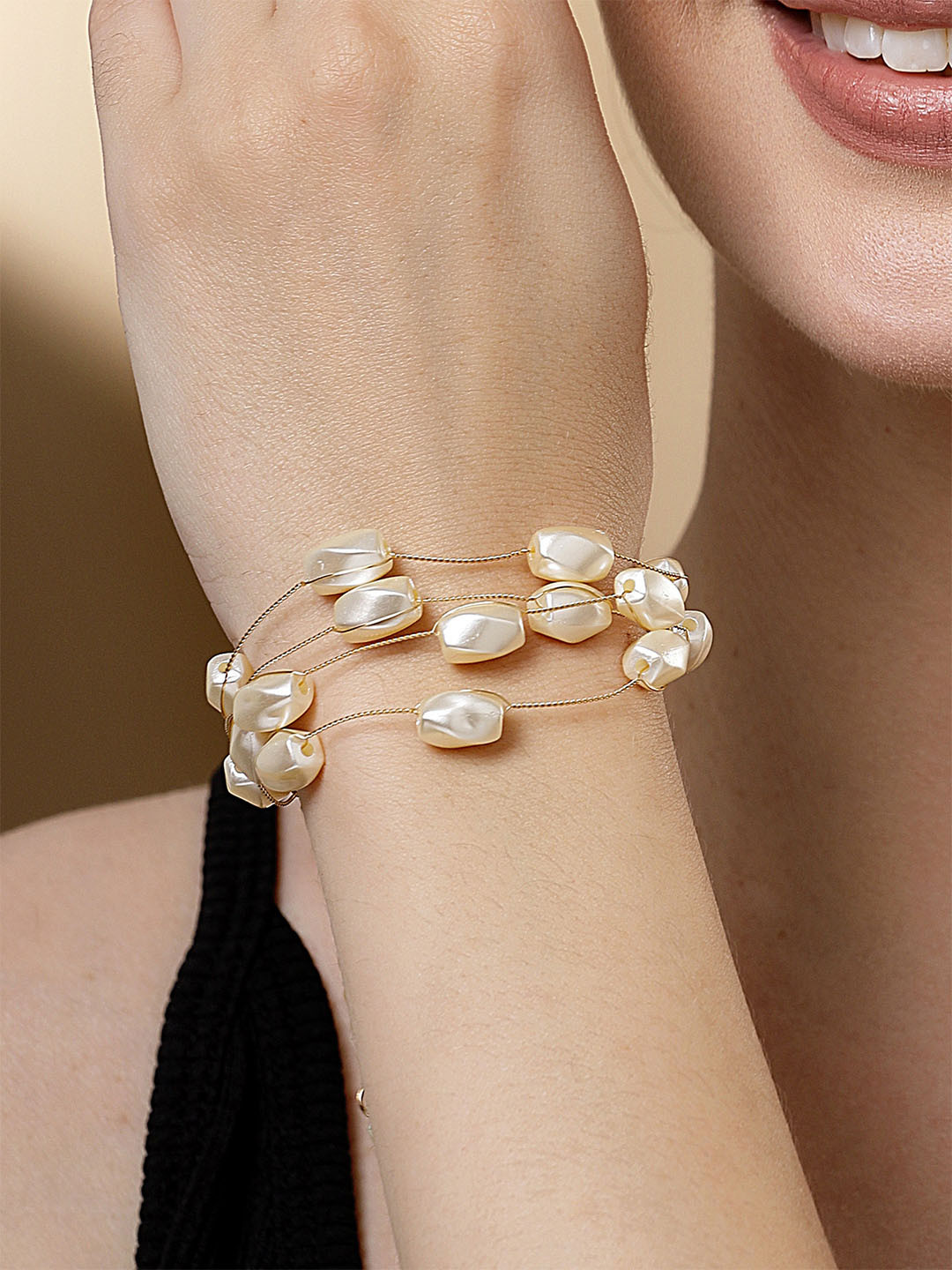 

Bohey by KARATCART Gold Plated Pearls Multistrand Bracelet