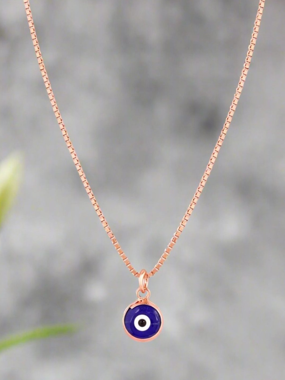 

Zavya 925 Sterling Silver Rose Gold-Plated Cubic Zirconia Evil Eye Pendant With Chain