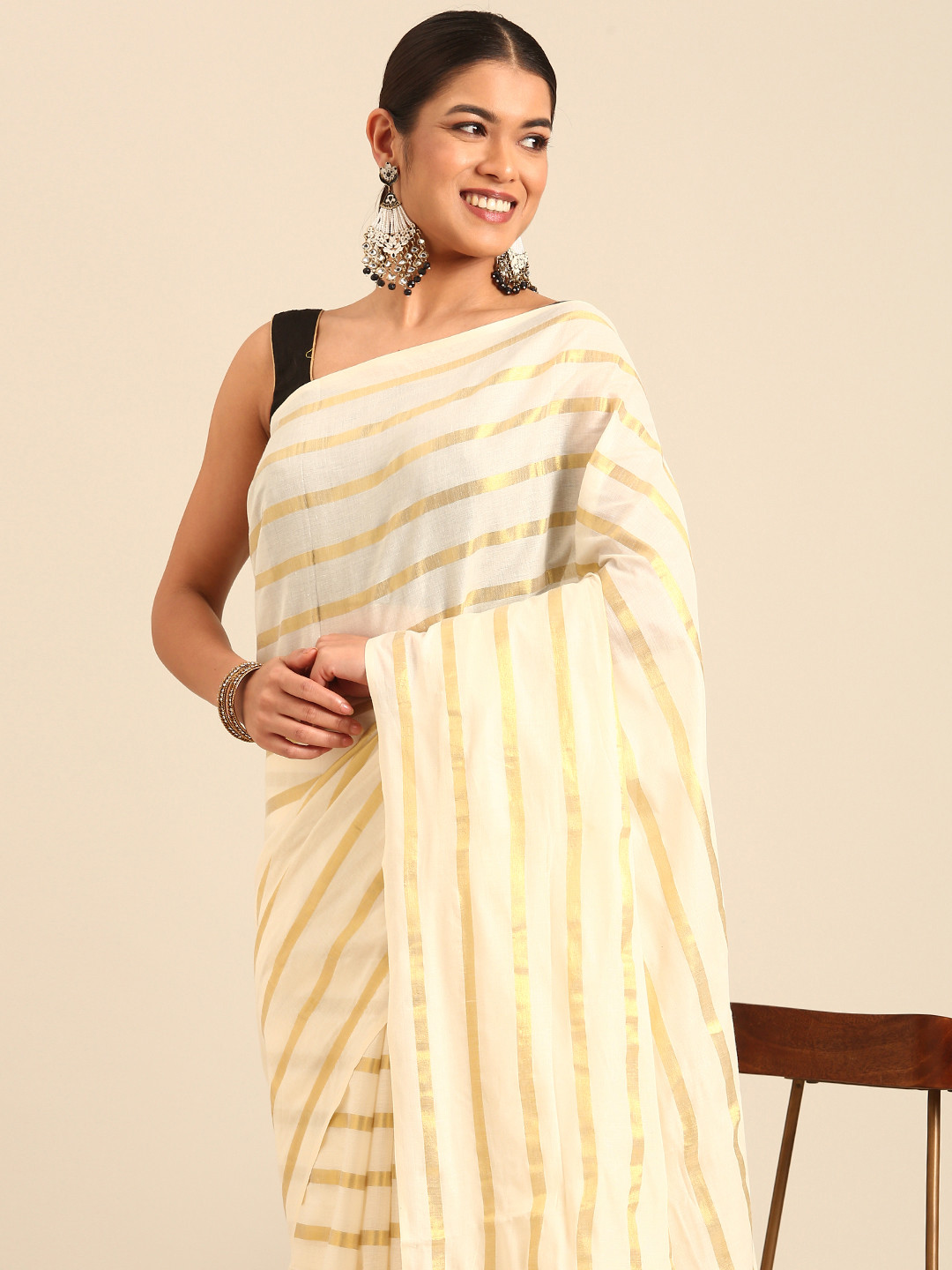 

Kalyan Silks Striped Zari Kasavu Saree, Cream
