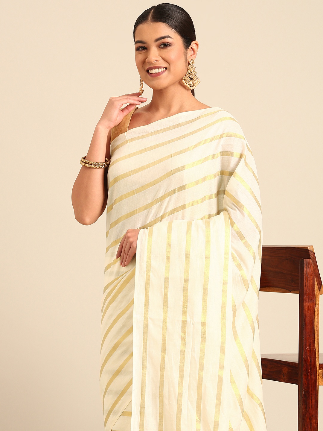 

Kalyan Silks Striped Zari Kasavu Saree, Cream