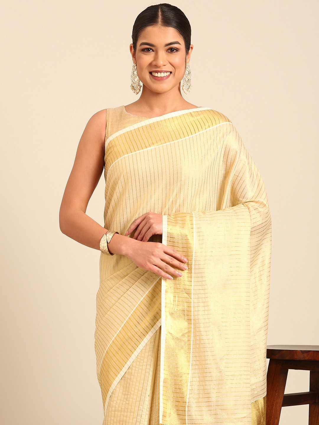

Kalyan Silks Striped Zari Kasavu Saree, Cream