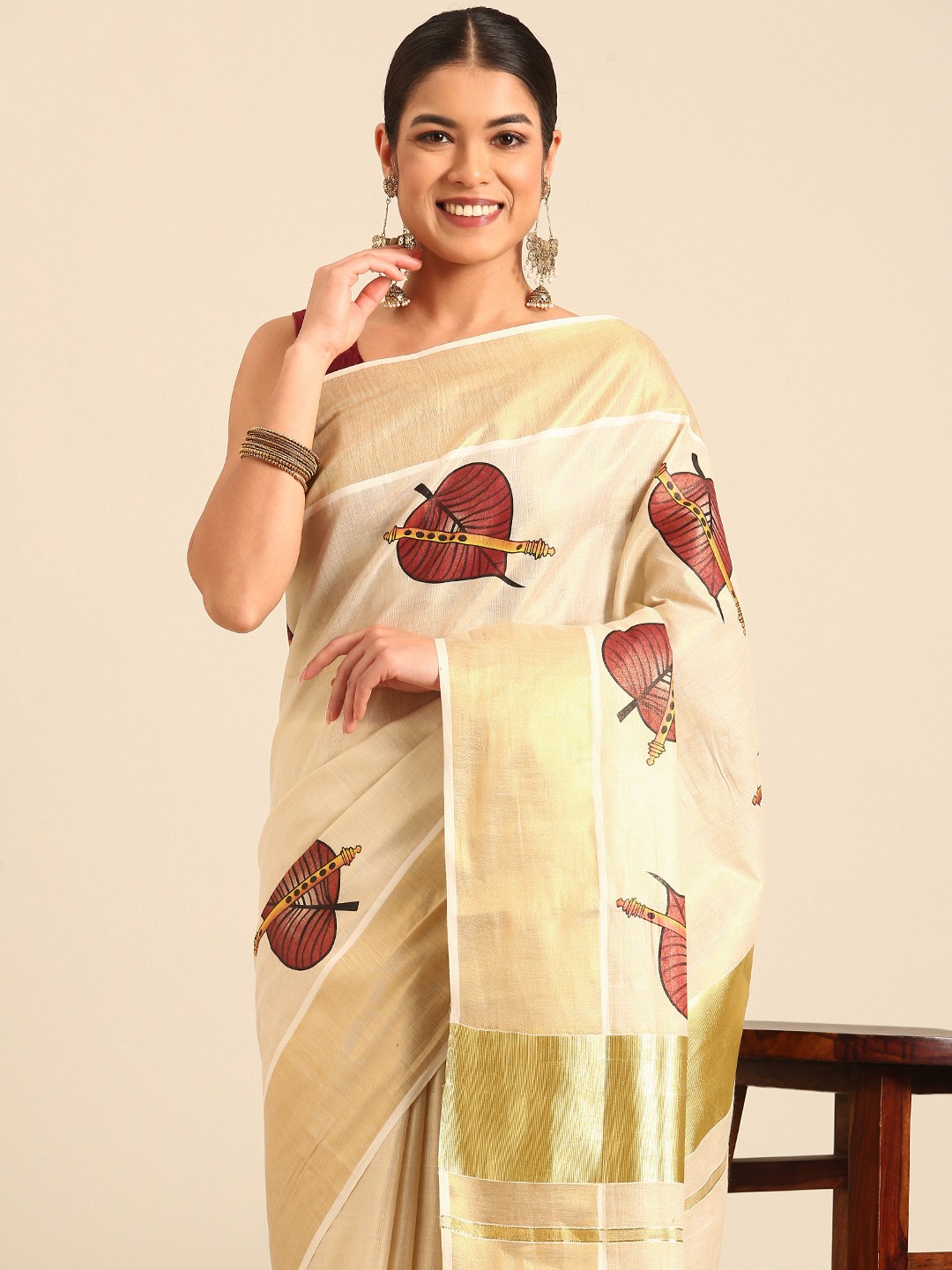 

Kalyan Silks Floral Zari Kasavu Saree, Cream