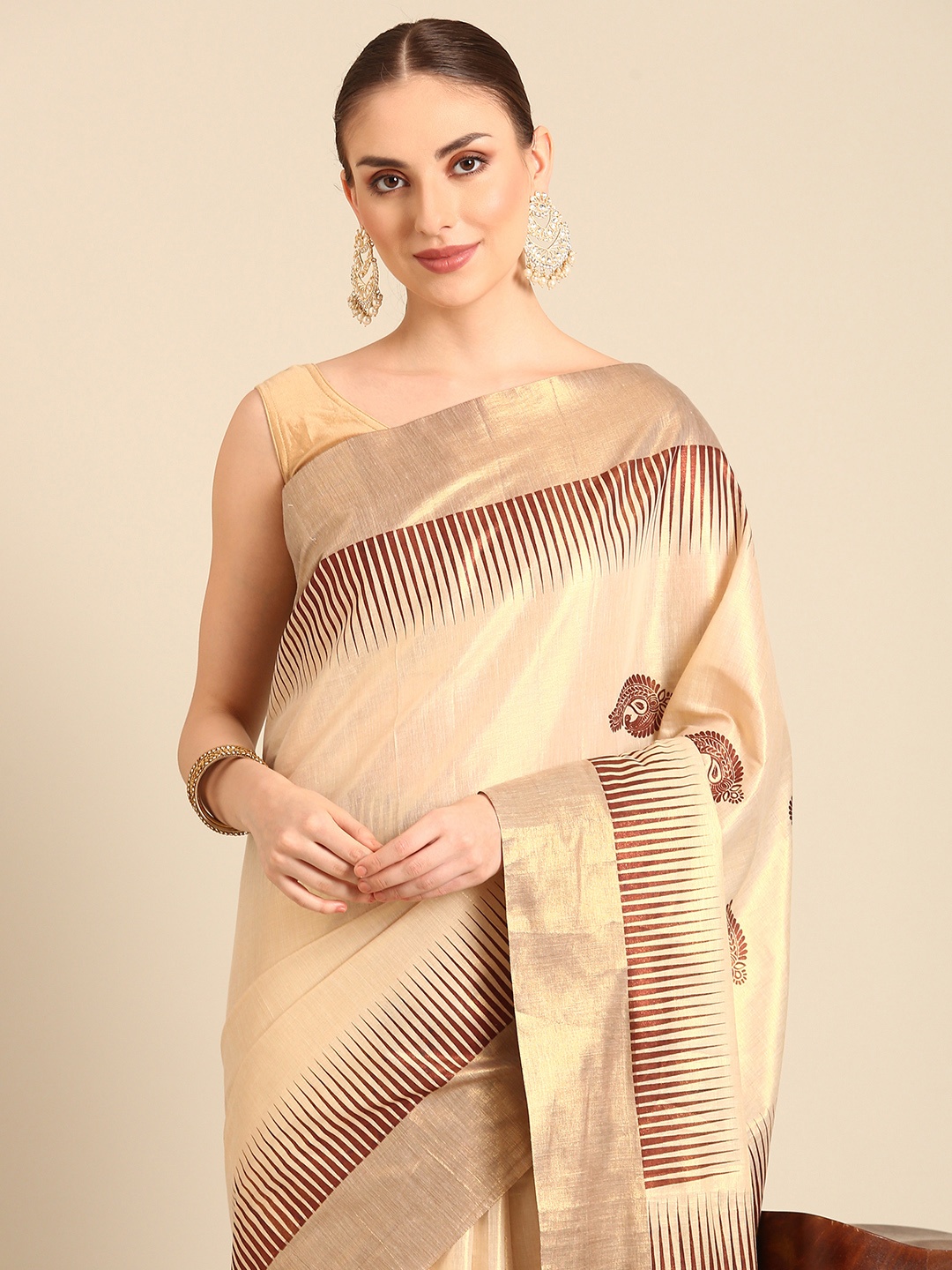 

Kalyan Silks Ethnic Motifs Printed Zari Kasavu Saree, Cream