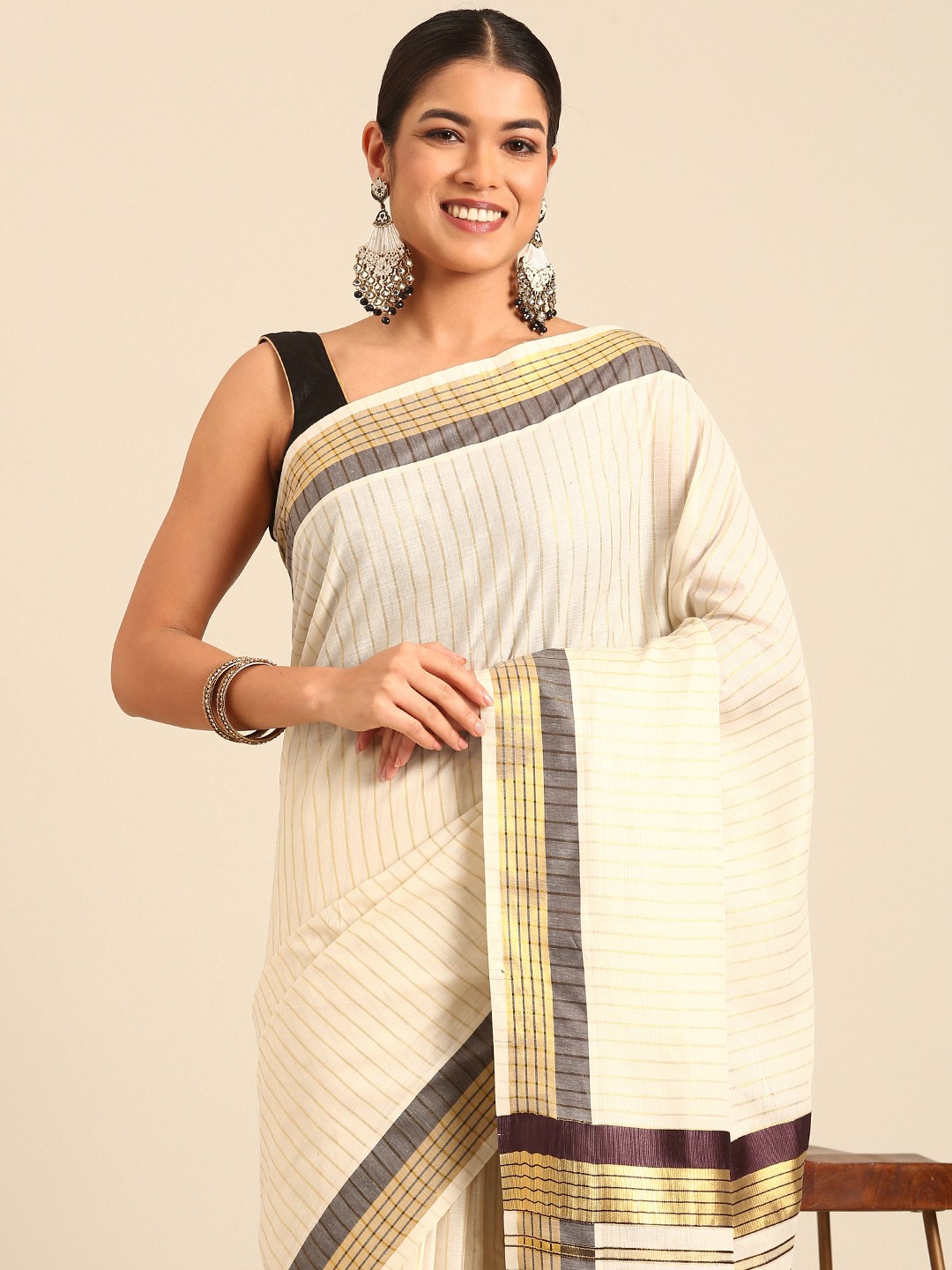 

Kalyan Silks Striped Zari Kasavu Saree, Cream