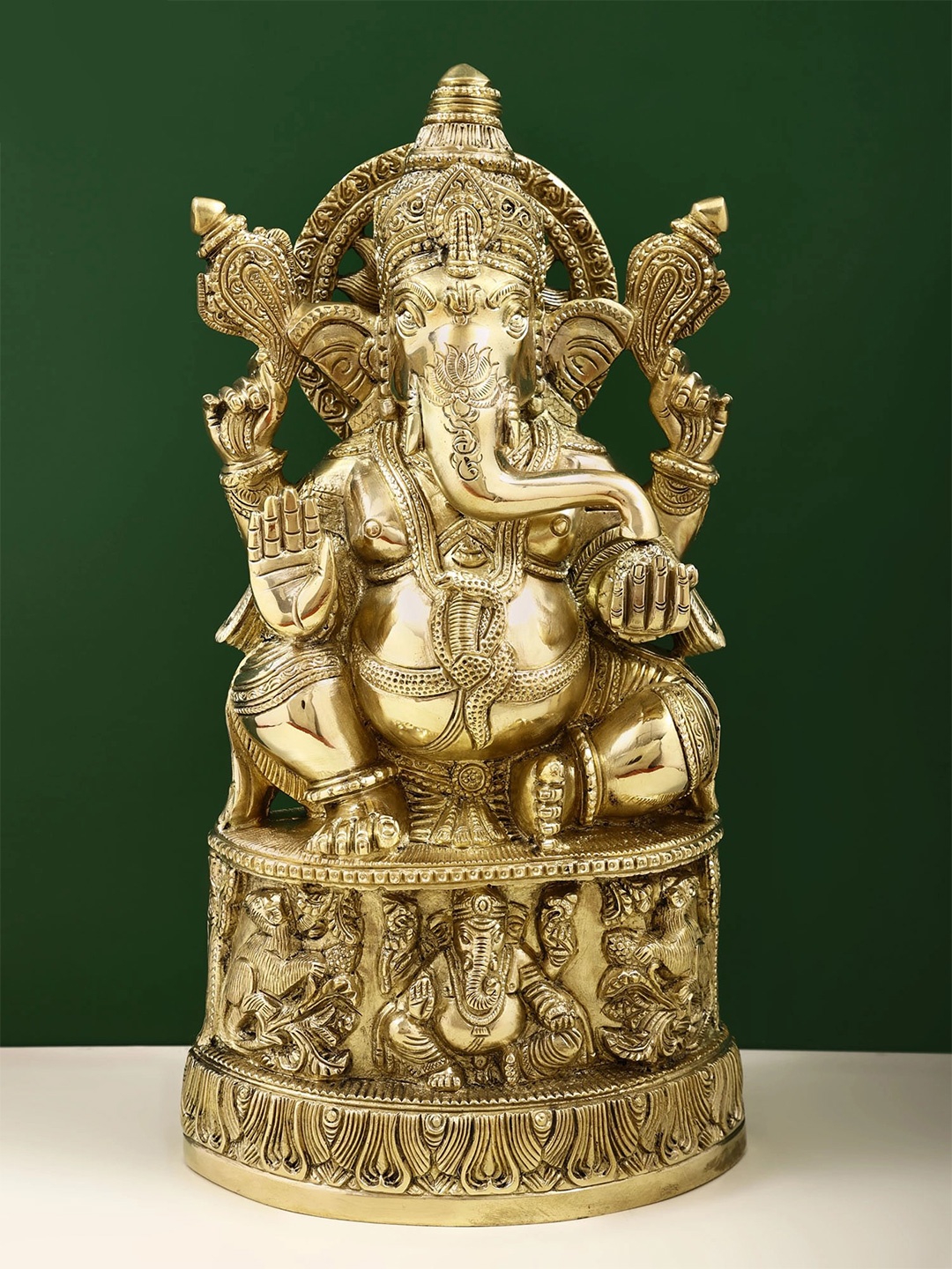 

Exotic India Gold Toned Brass Religious Idol Showpiece