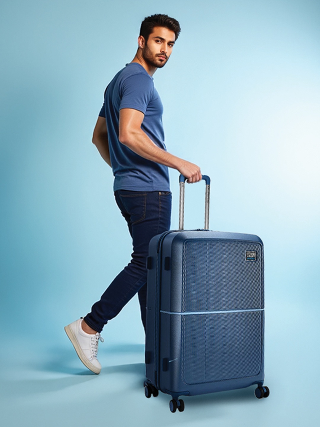 

Urban Jungle by Safari Caliber Textured Hard Suitcase Trolley Bags, Blue
