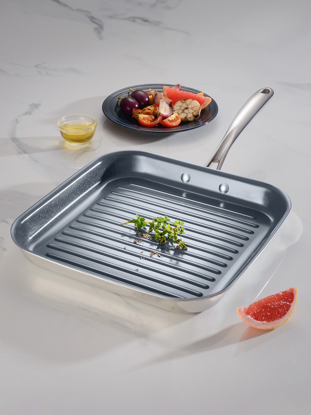 

Tramontina Fusao Non Toxic Stainless Steel Ceramic Triply Stay Cool Handle Grill Pan, Silver