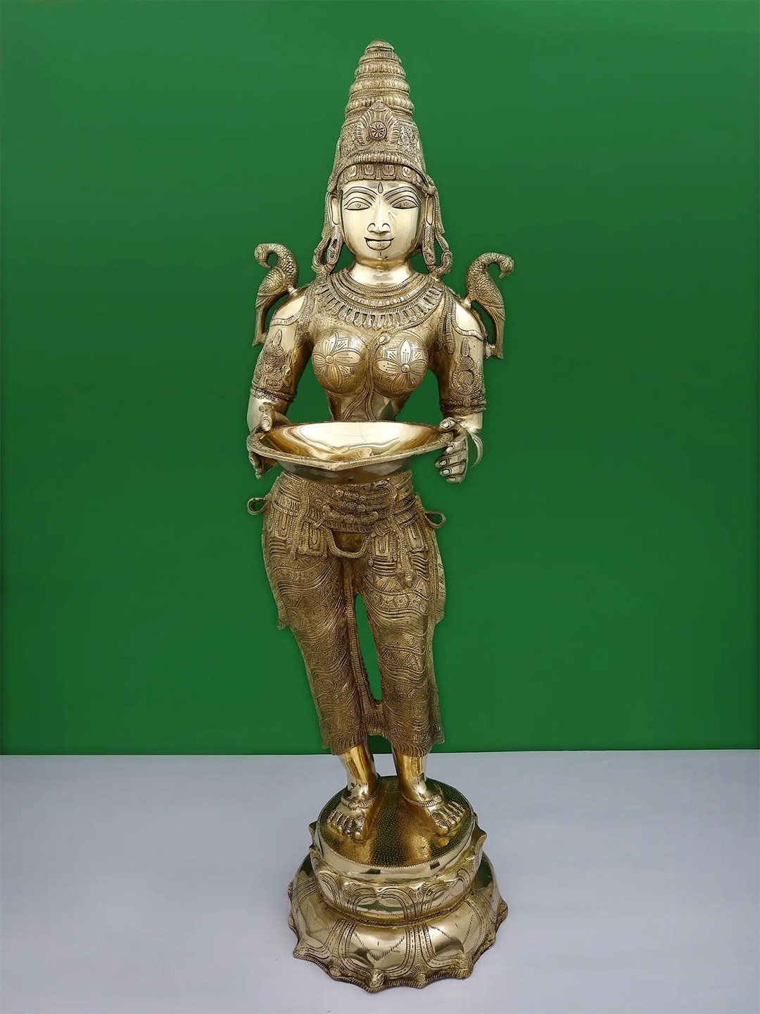 

Exotic India Gold Toned Religious Idol Showpiece