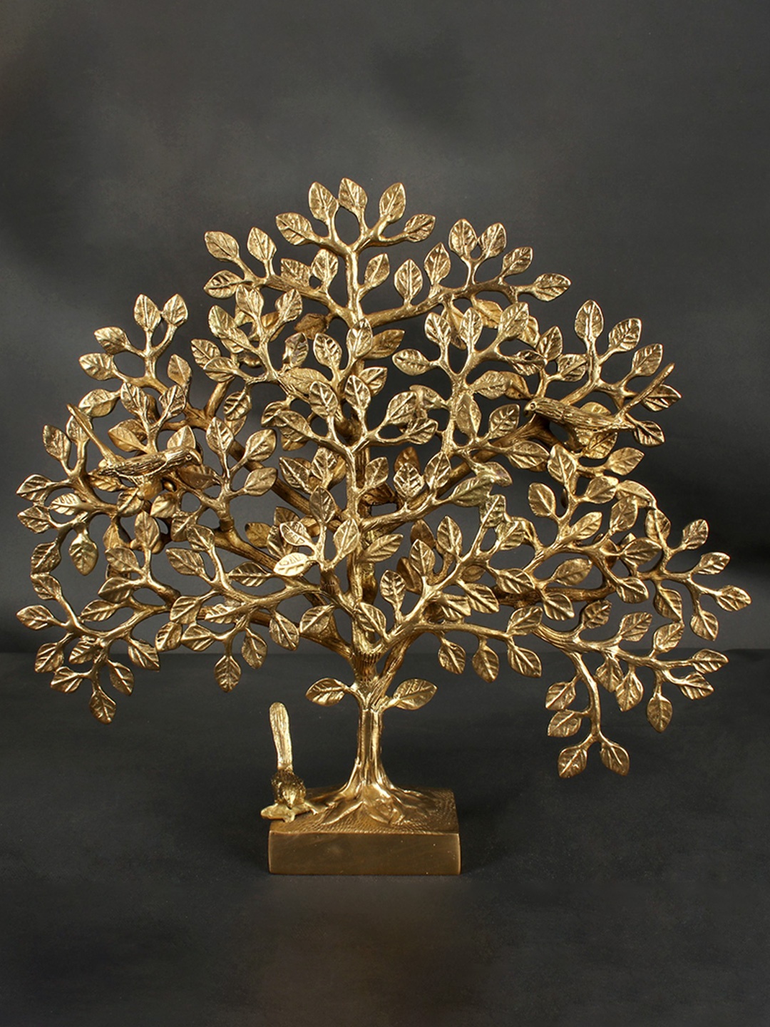 

Exotic India Gold Toned Brass Textured Figurine Showpiece