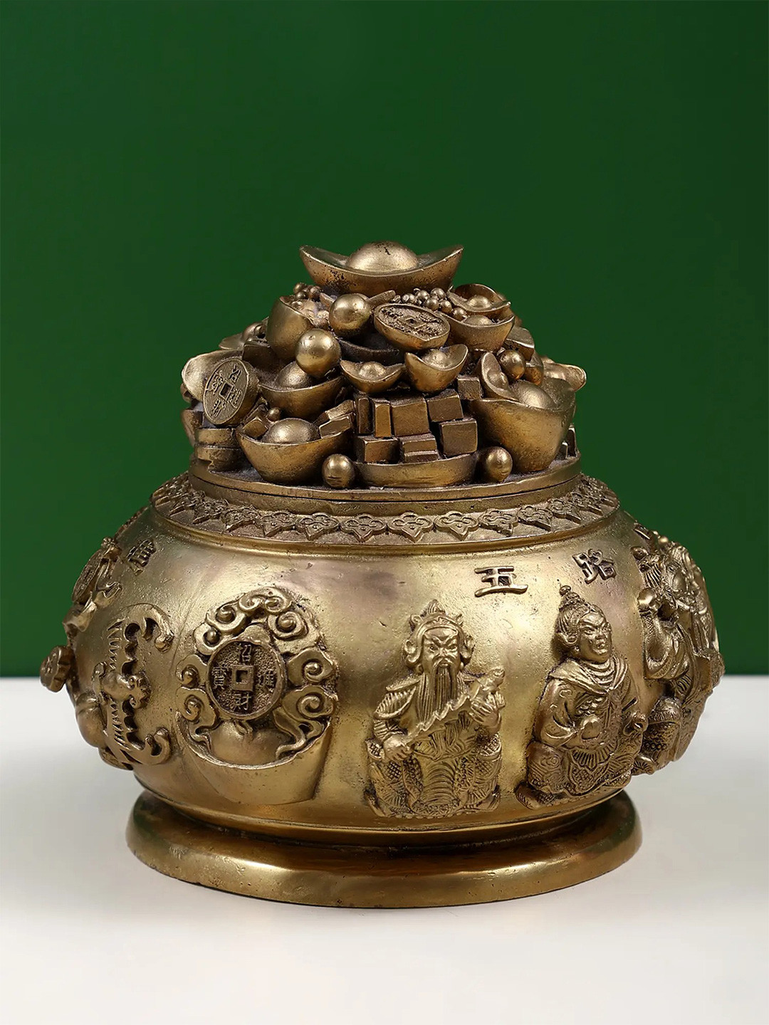 

Exotic India Gold-Toned Feng Shui Wealth Pot Showpiece