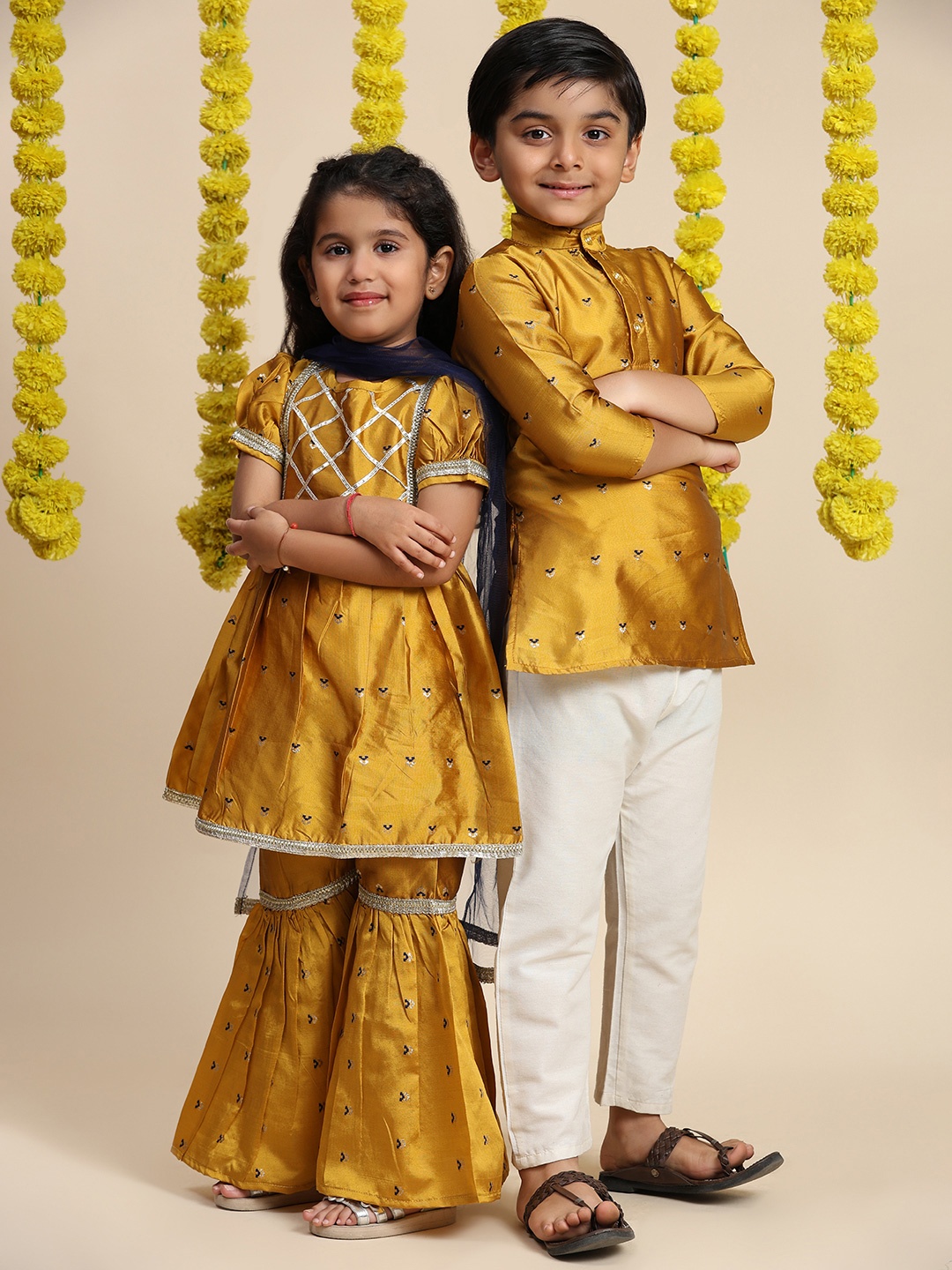 

Cutiekins Girls Ethnic Motifs Embroidered Gotta Patti A-Line Kurta With Sharara & Dupatta, Mustard