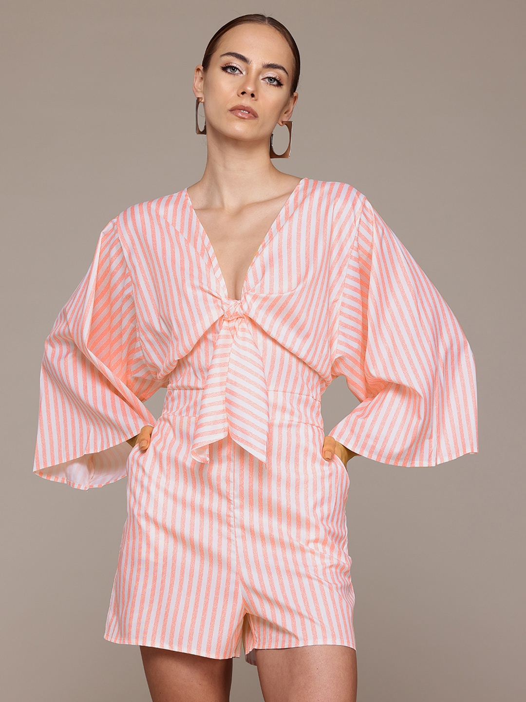 

bebe Soft Romance Flared Sleeve Twisted Detail Striped Playsuit, Pink