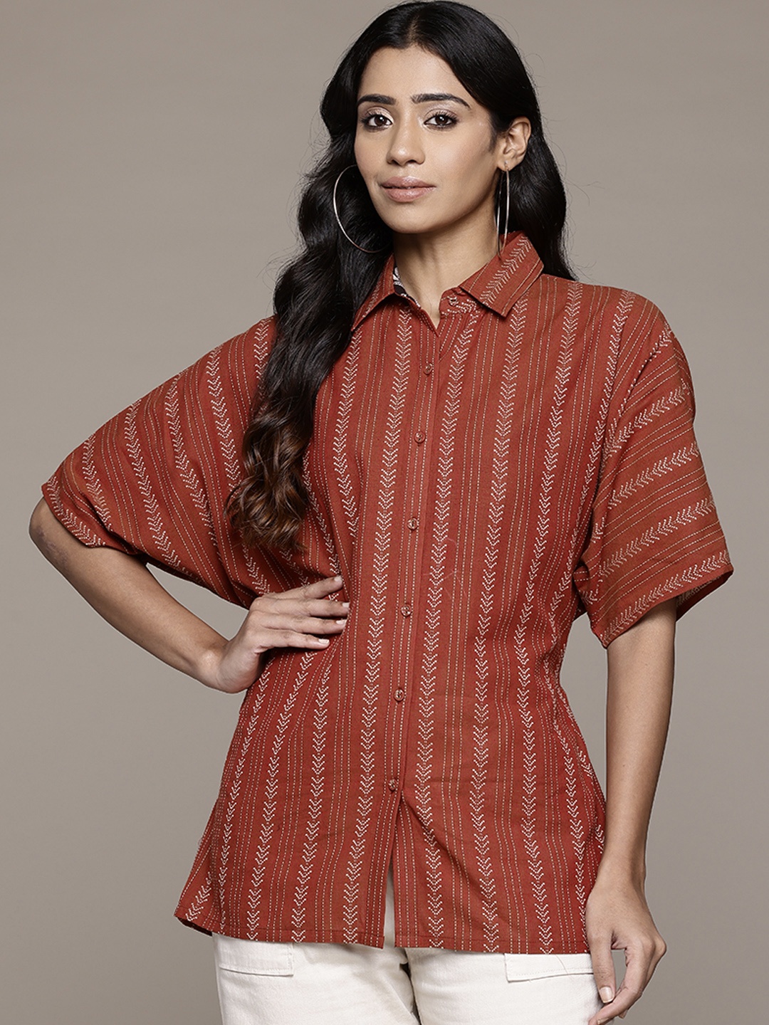 

Ritu Kumar Geometric Embroidered Batwing Sleeves Shirt Style Longline Top, Rust
