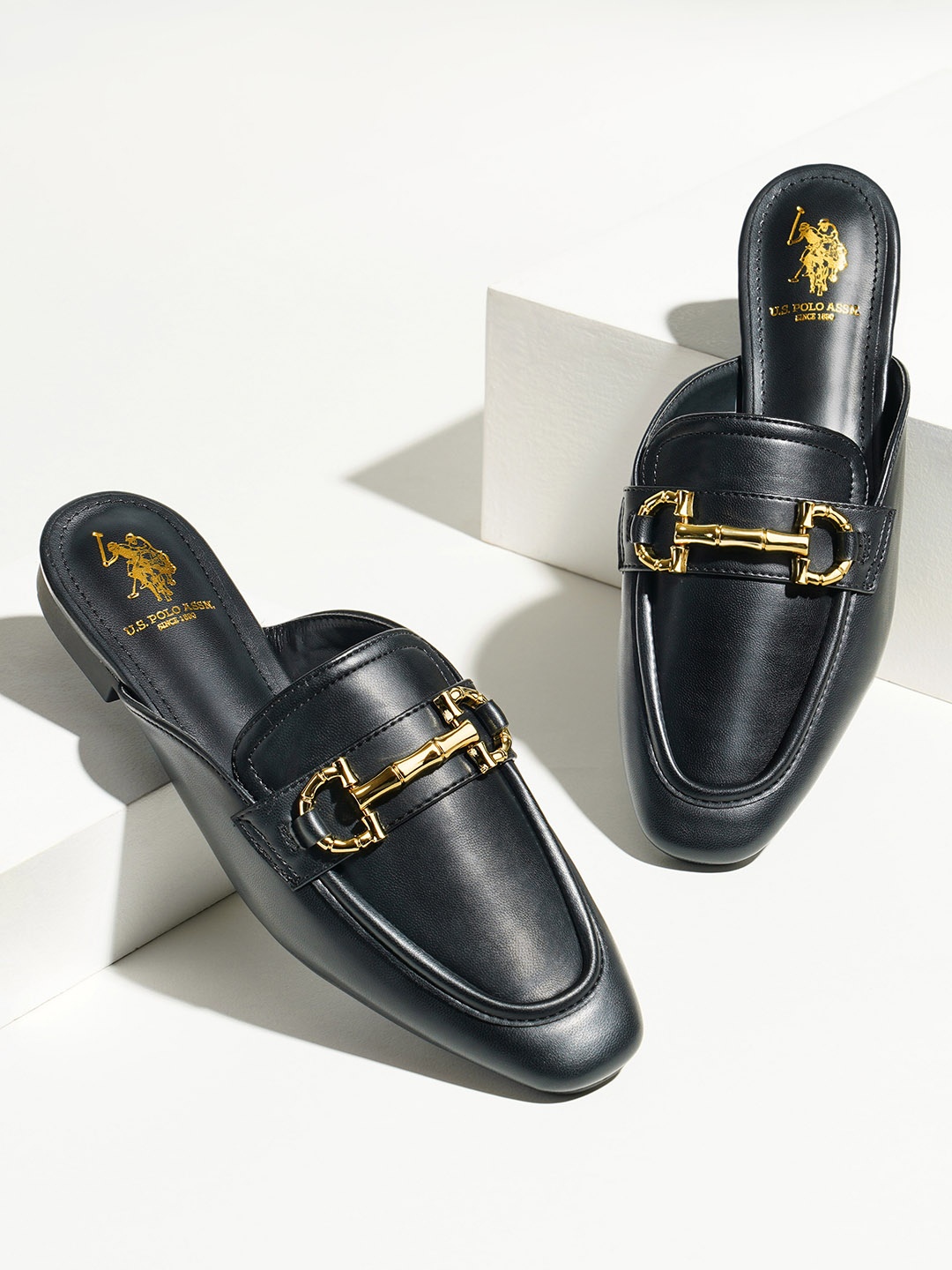 

U.S. Polo Assn. TECLA Women Pointed Toe PU Mules With Buckles, Black