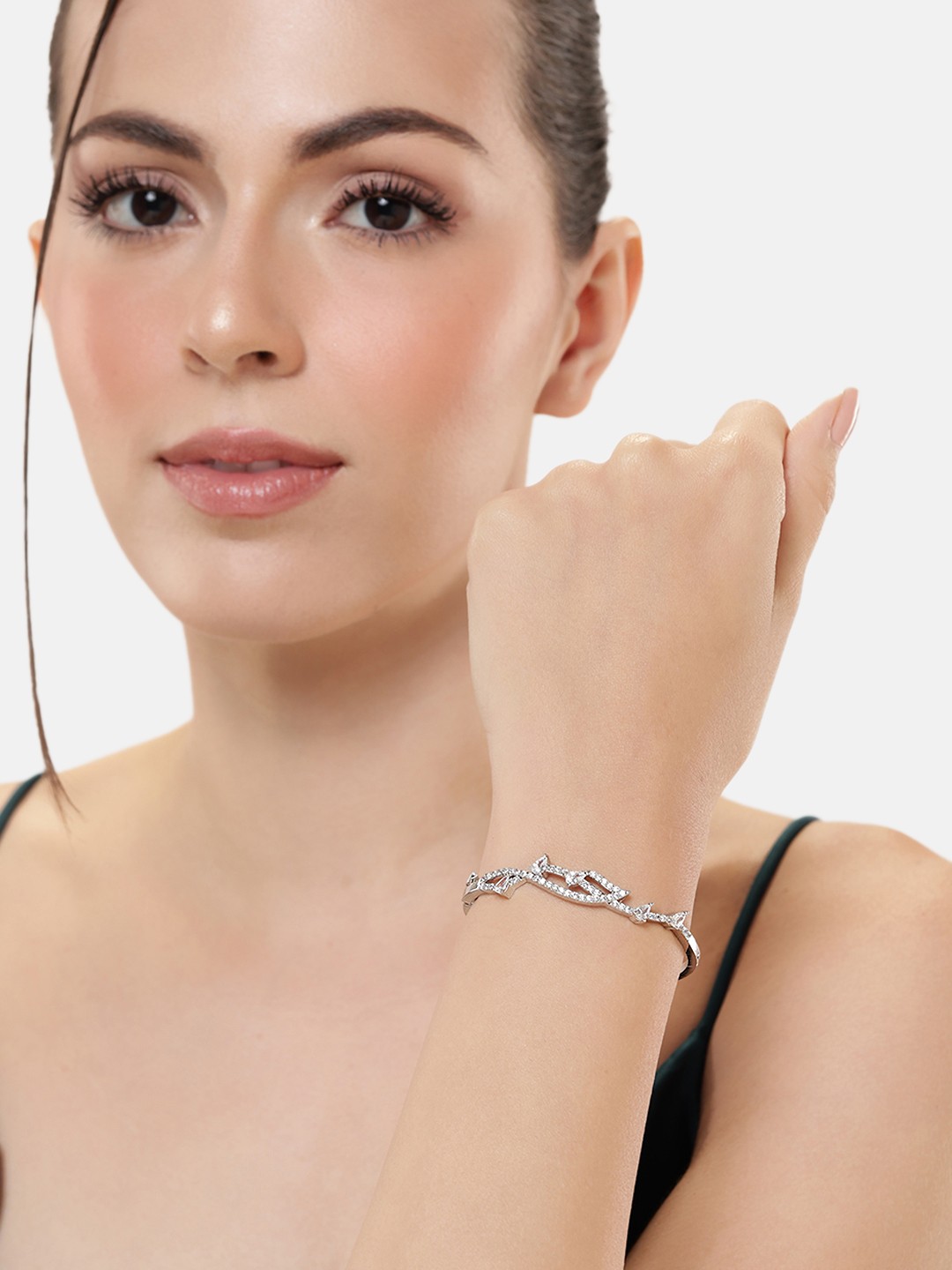 

Manikya Women Brass Cubic Zirconia Handcrafted Rhodium-Plated Bangle-Style Bracelet, Silver