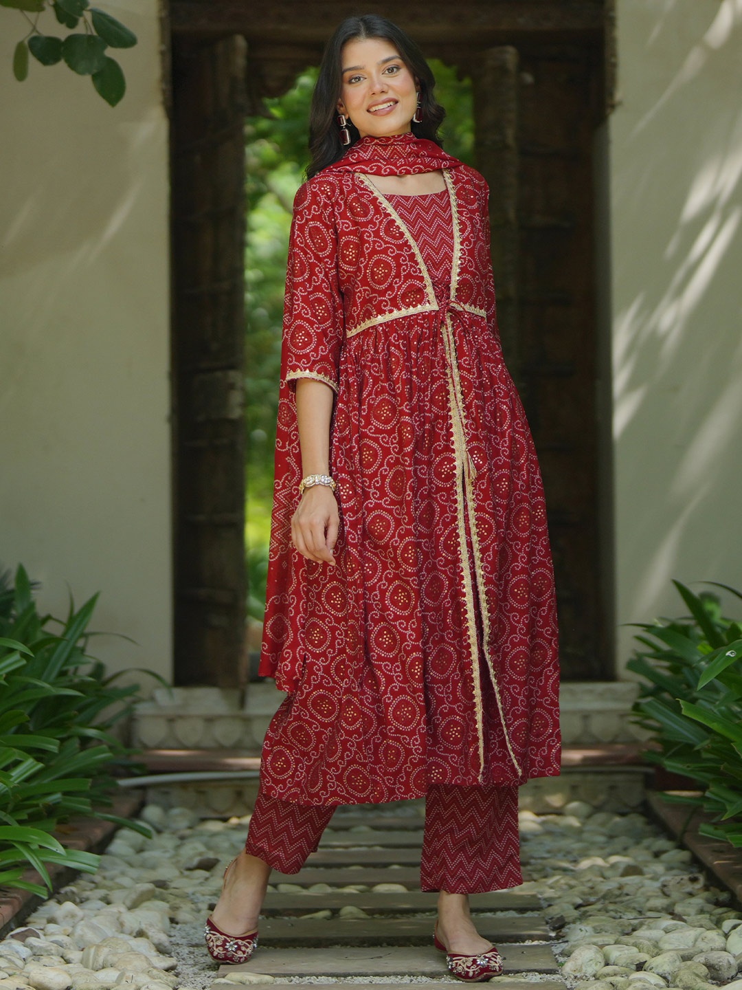 

Libas Bandhani Printed Pleated Gotta Patti A-Line Kurta With Trouser & Dupatta, Red