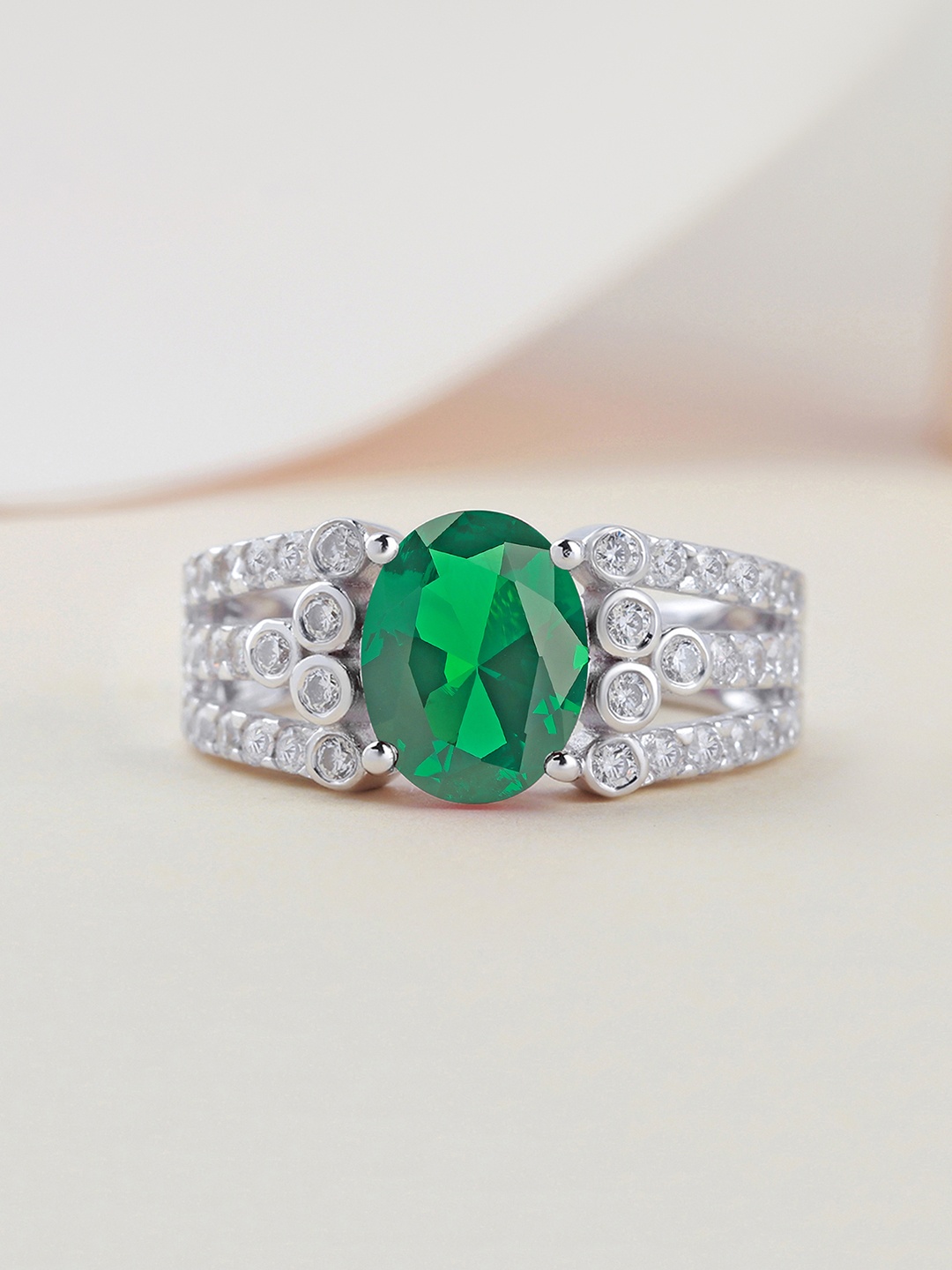 

Ornate Jewels 925 Sterling Silver Oval Cut Green Emerald and AD Cluster Solitaire Ring