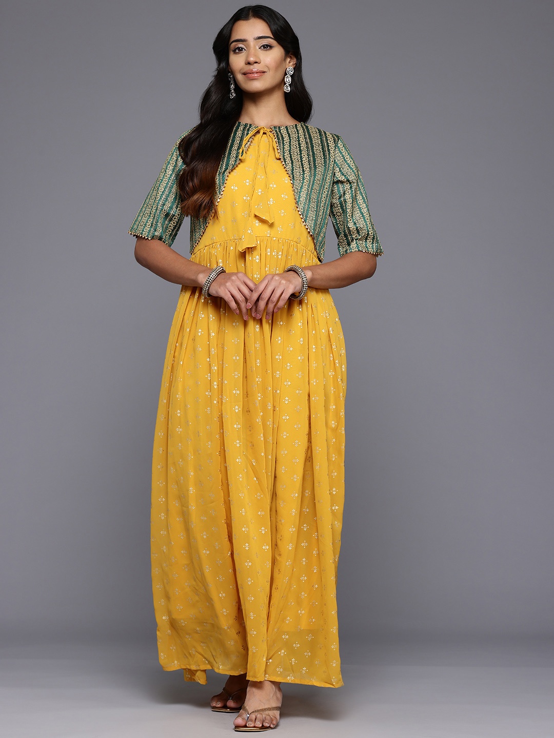 

Ahalyaa Ethnic Motifs Printed Maxi Gown with Jacket, Mustard