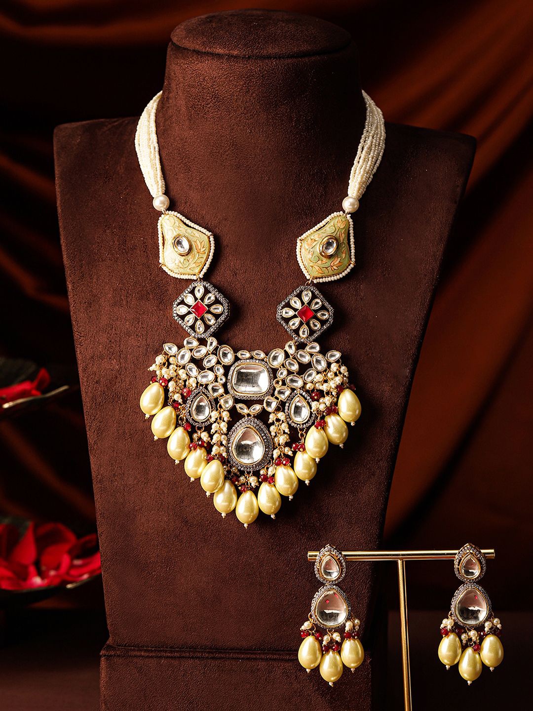 

Priyaasi Gold Plated Kundan Studded Beaded Jewellery Set