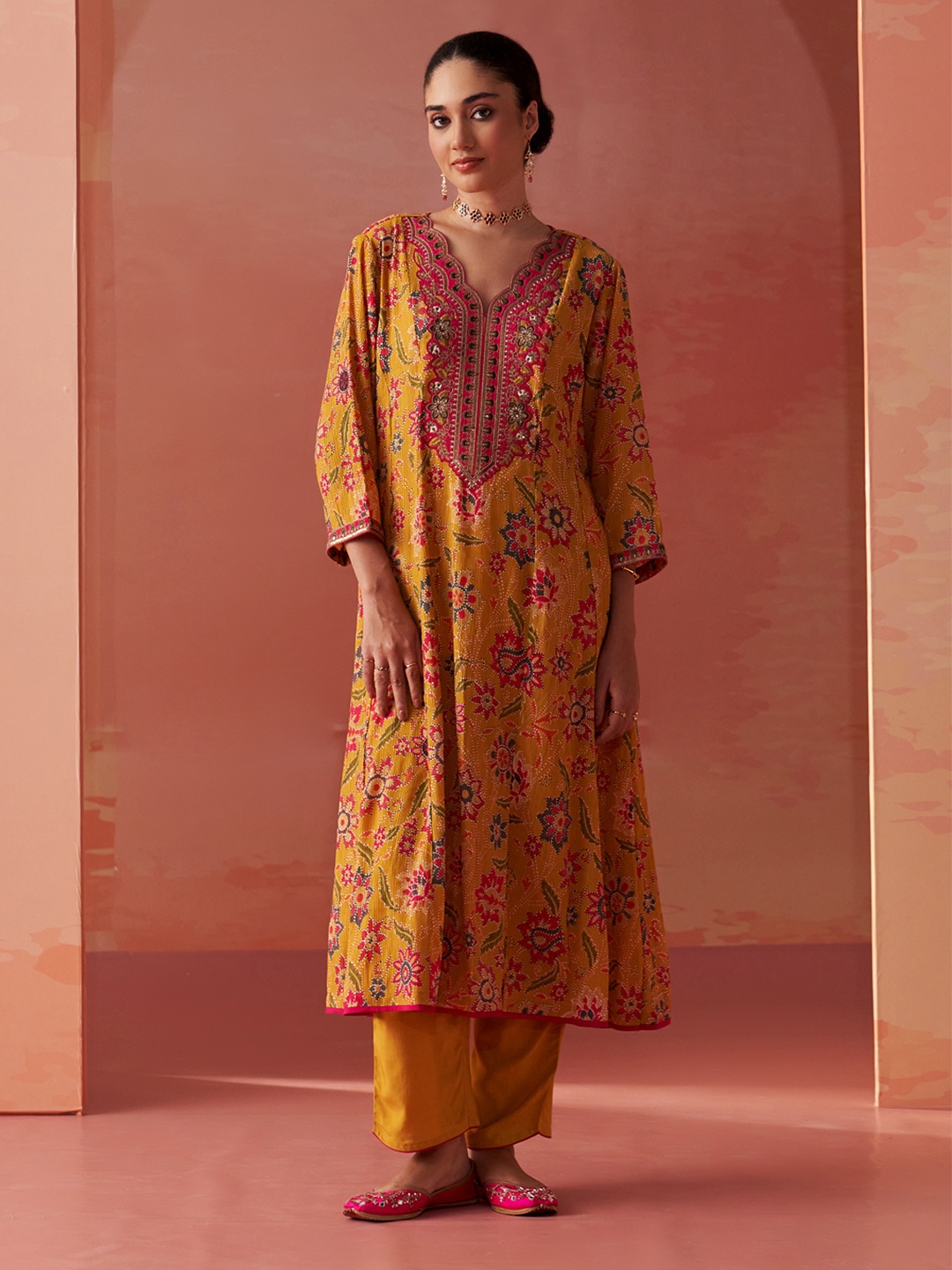 

Lakshita Floral Printed Sequinned A-Line Kurta With Trousers, Mustard