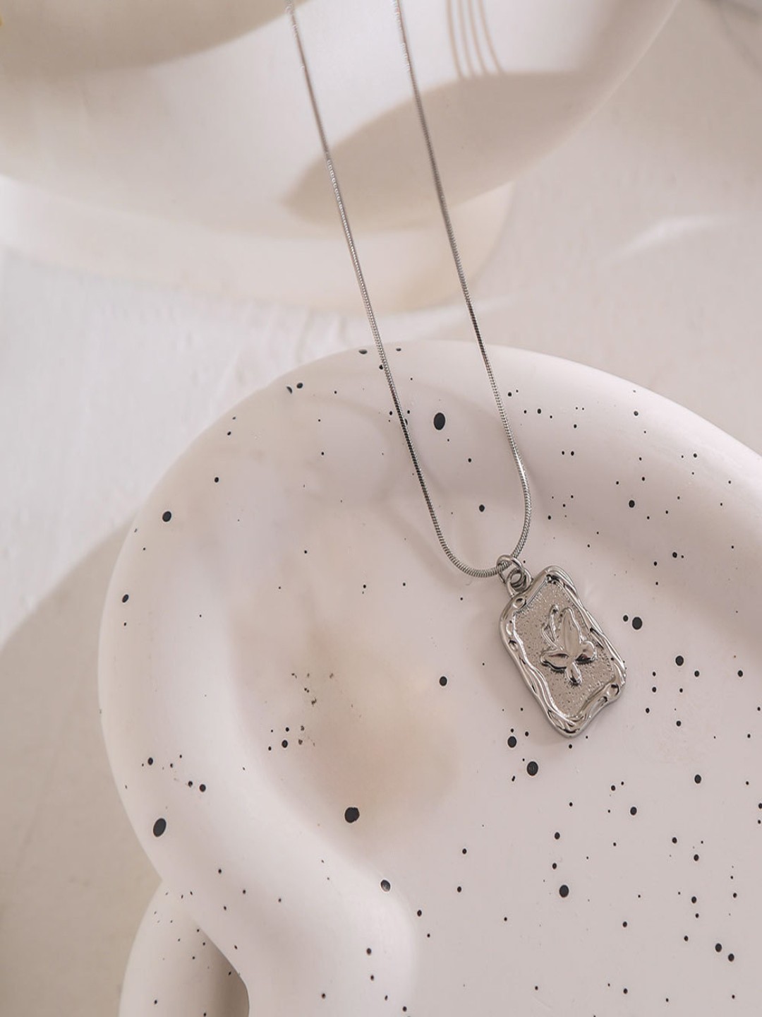 

AQUASTREET Silver Plated Stainless Steel Square Butterfly Pendant With Chain