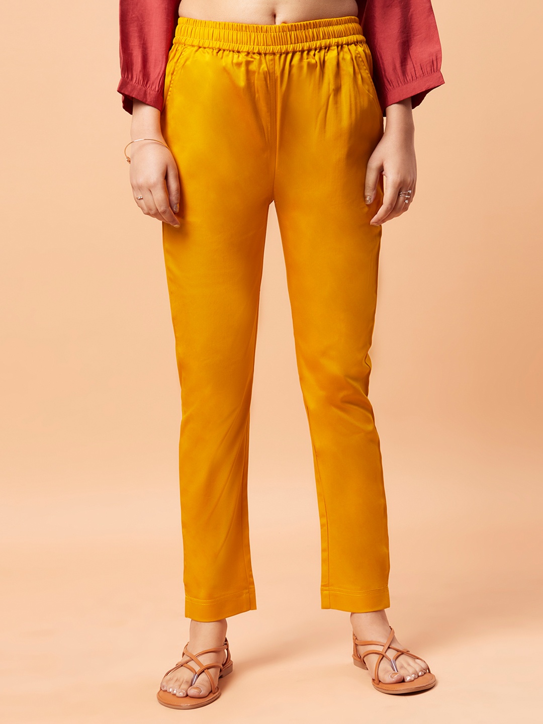 

Bottoms.love Women Solid Mid-Rise Lycra Plain Cigerette Trousers, Yellow