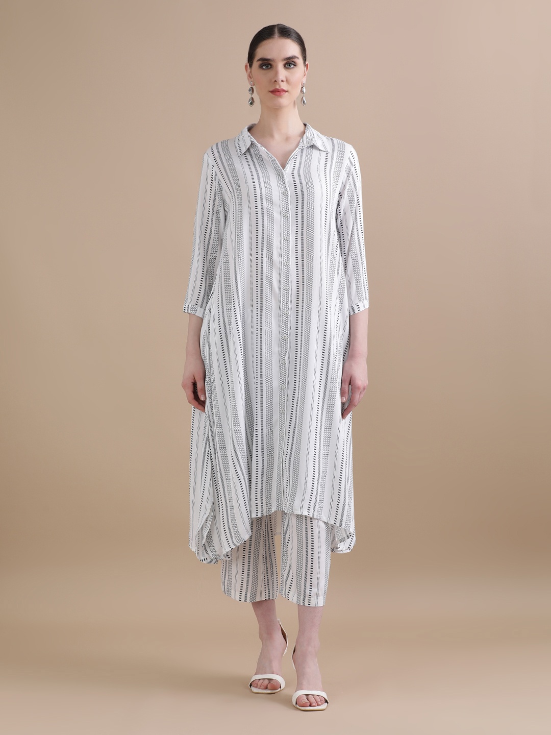 

BLACK & BLAH BLAH Relaxed Fit Stripes Printed Flared Liva Kurta and Trouser (Set of 2), Off white