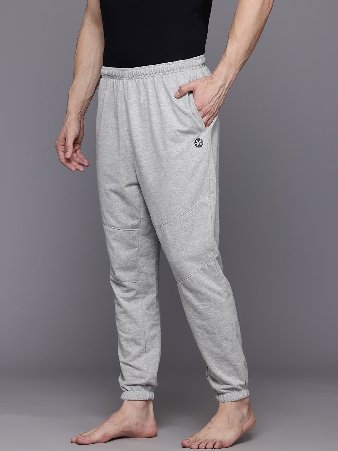 

HRX by Hrithik Roshan Men Mid-Rise Regular Fit Yoga Joggers, Grey melange