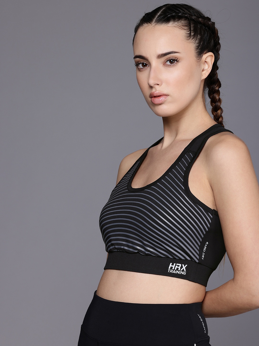 

HRX by Hrithik Roshan Striped Rapid Dry Lightly Padded Training Bra AW24_W_BA_KT8144_03_A, Black