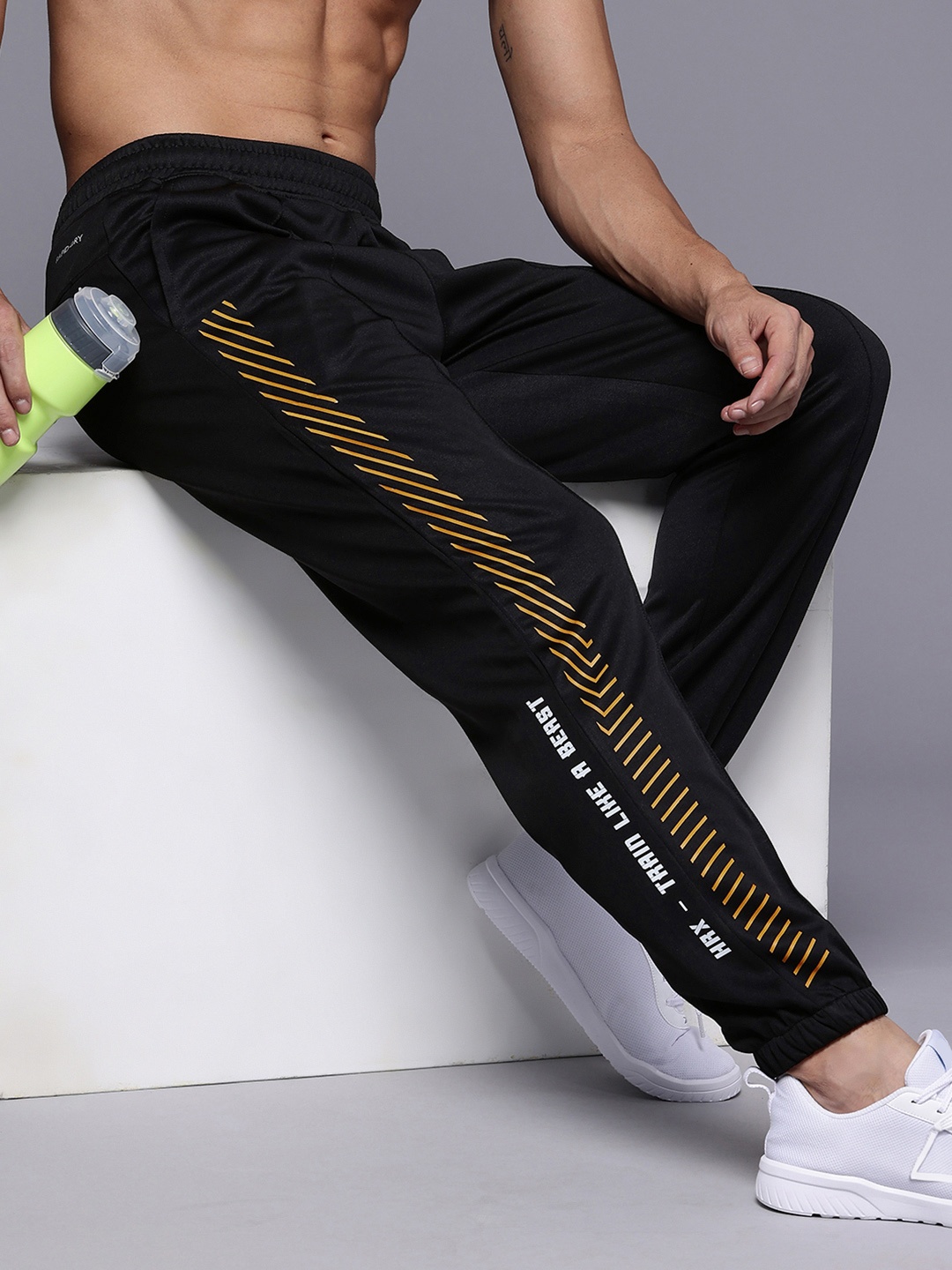 

HRX by Hrithik Roshan Men Brand Logo Printed Rapid Dry Training Joggers, Black