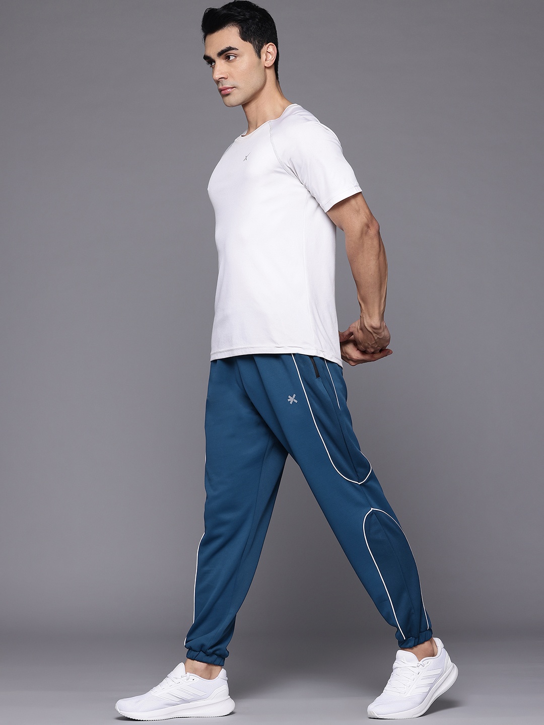 

HRX by Hrithik Roshan Men Rapid-Dry Contrast Piping Detail Training Joggers, Teal