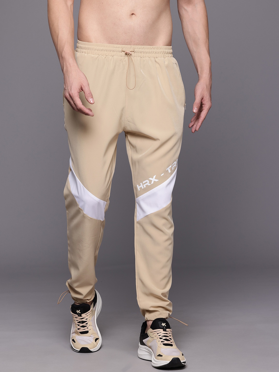 

HRX by Hrithik Roshan Men Striped Detail Training Track Pants, Beige