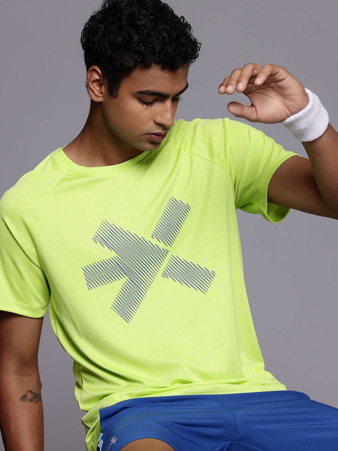 

HRX by Hrithik Roshan Brand Logo Printed Rapid-Dry Training or Gym Sports T-shirt, Fluorescent green