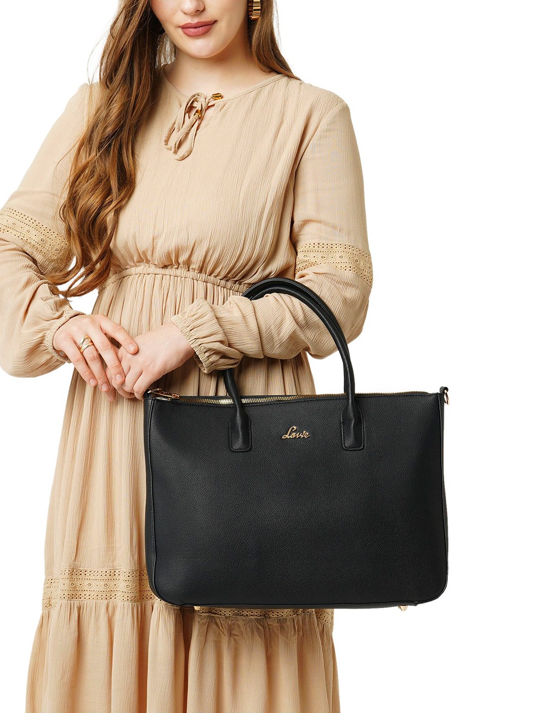 

Lavie Structured Handheld Bag with Tasselled, Black