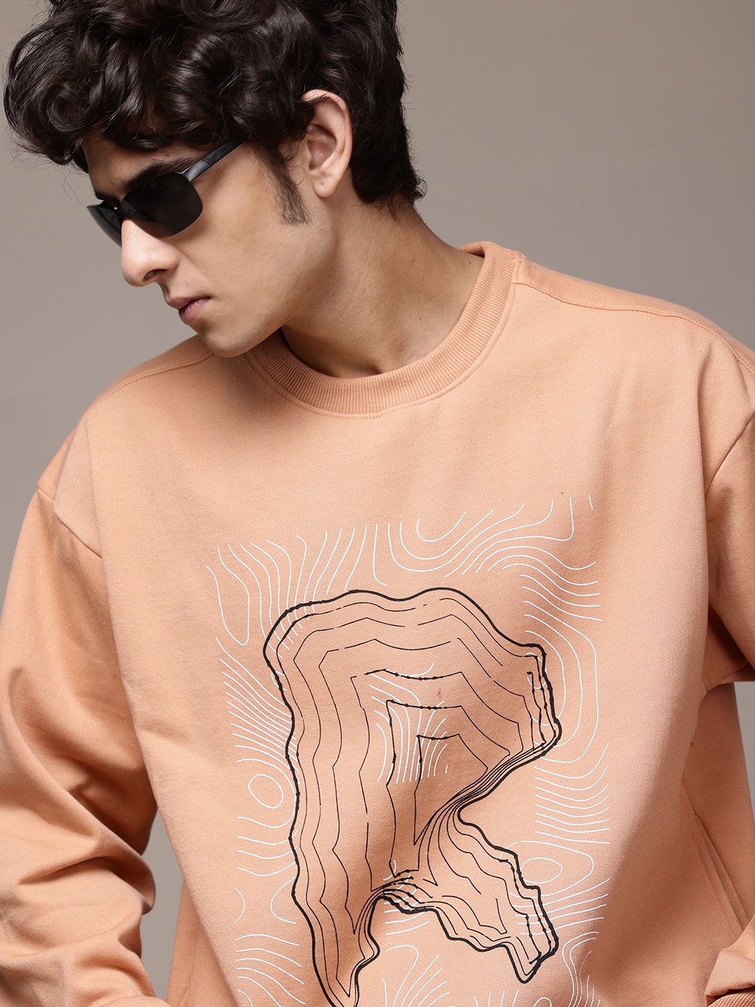 

The Roadster Lifestyle Co. Men Printed Relaxed Fit Sweatshirt, Peach