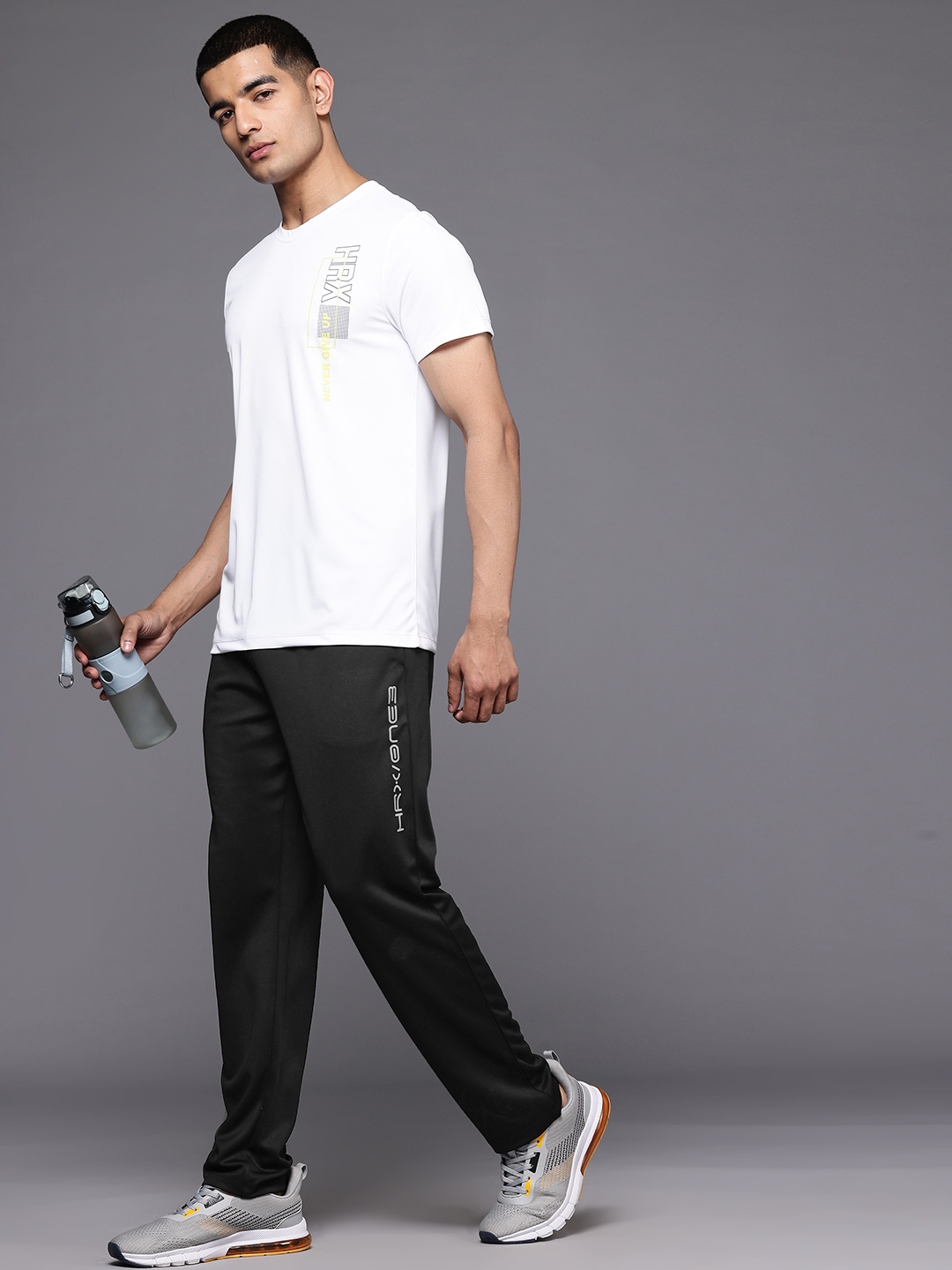 

HRX by Hrithik Roshan Men Regular Fit Rapid-Dry Running Track Pants With Reflective Detail, Black