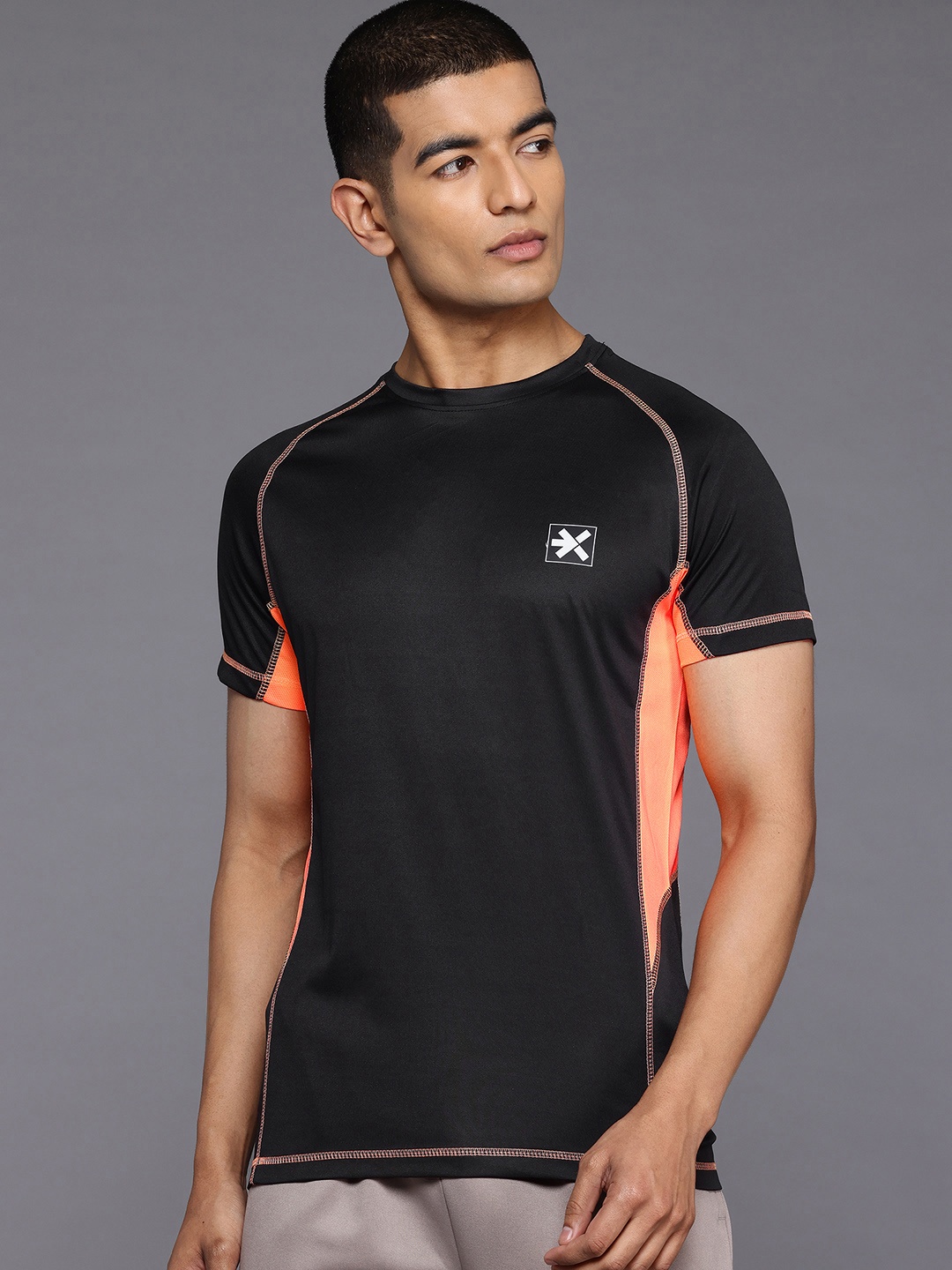 

HRX by Hrithik Roshan Colourblocked Raglan Sleeves Sports T-shirt with Brand Logo Detail, Black