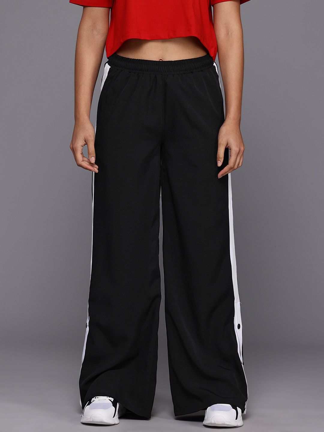

HRX by Hrithik Roshan Women Side Stripe Button-Hem Lifestyle Track Pants, Black
