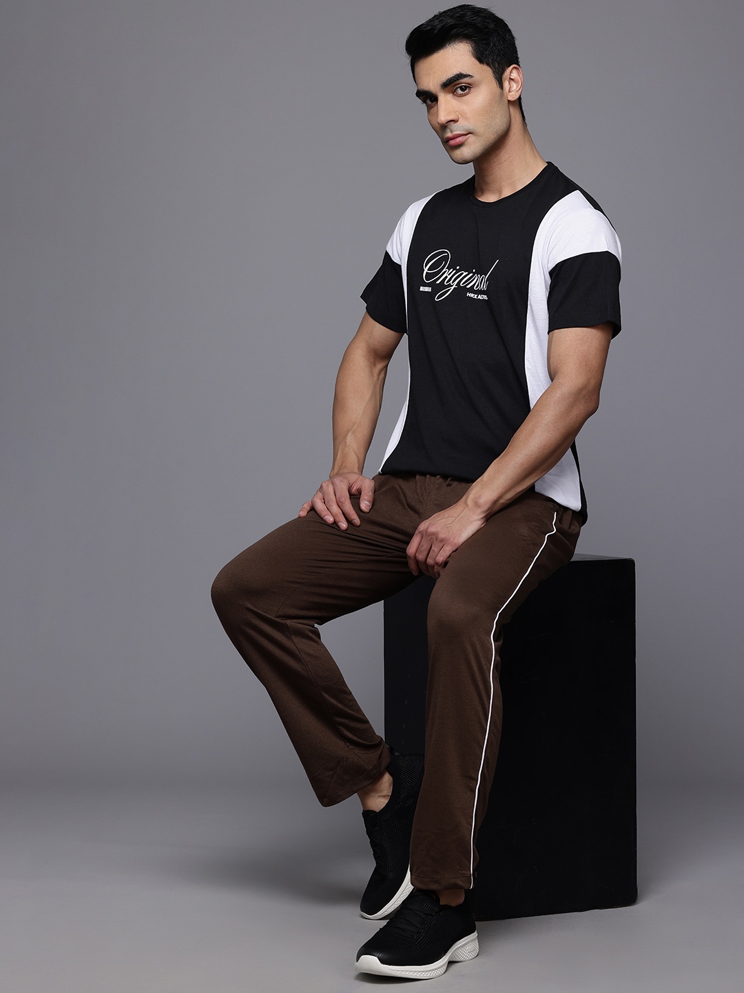 

HRX by Hrithik Roshan Printed Colourblocked T-shirt, Black