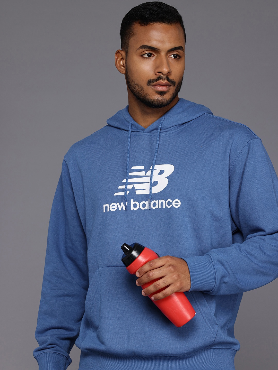 

New Balance Sport Essentials French Terry Logo Relaxed Fit Hooded Sweatshirt, Blue