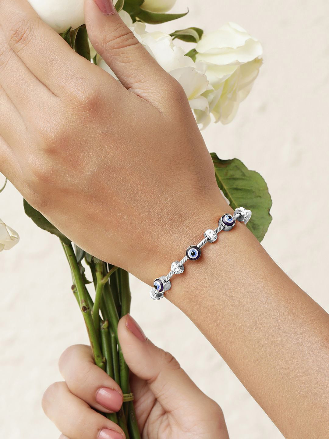 

Rubans Voguish Rhodium-Plated Stainless Steel TarnishFree CZ Demi-Fine Evil Eye Bracelet, Silver