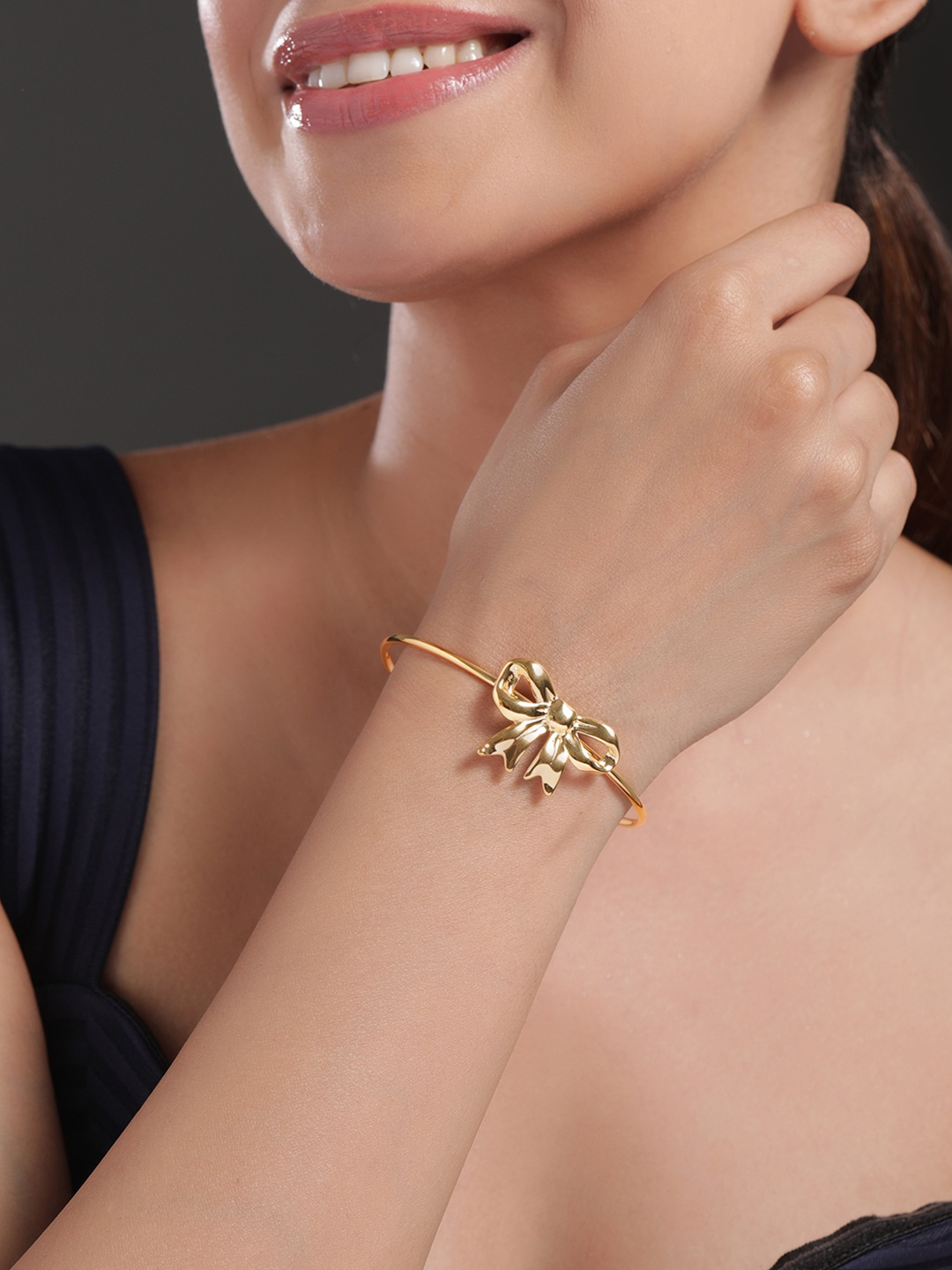

Rubans Voguish 18K Gold Plated StainlessSteel TarnishFree Demi-Fine Bowknot Cuff Bracelet