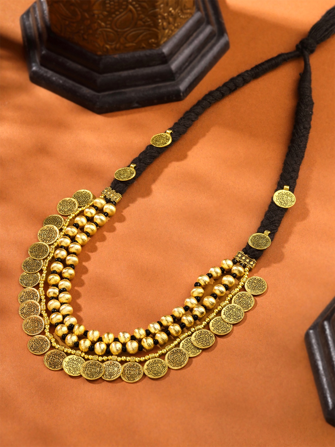

Yellow Chimes Gold-Plated Oxidised Coin Necklace